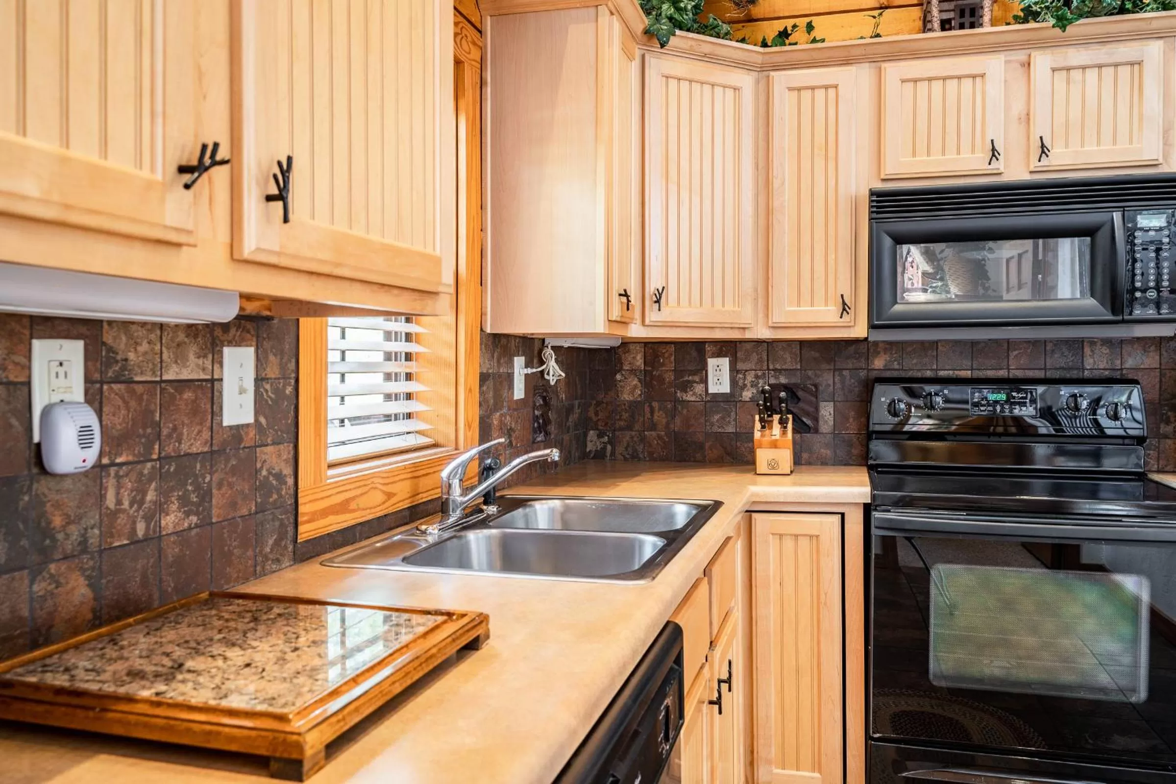 Kitchen or kitchenette in Cabins at Grand Mountain