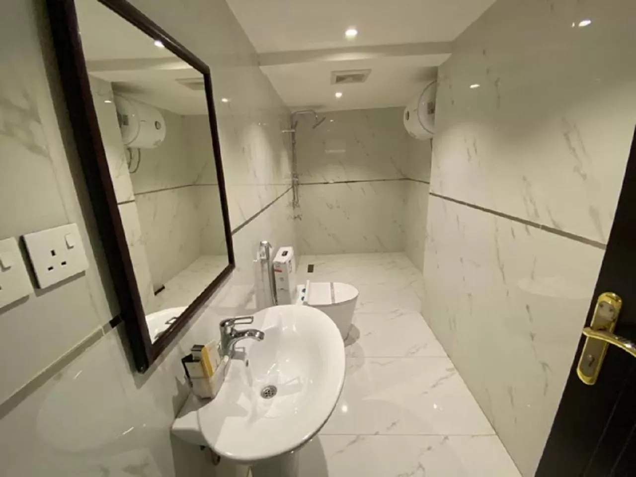 Bathroom in فيجن للشقق المخدومة ــ اقتصادي