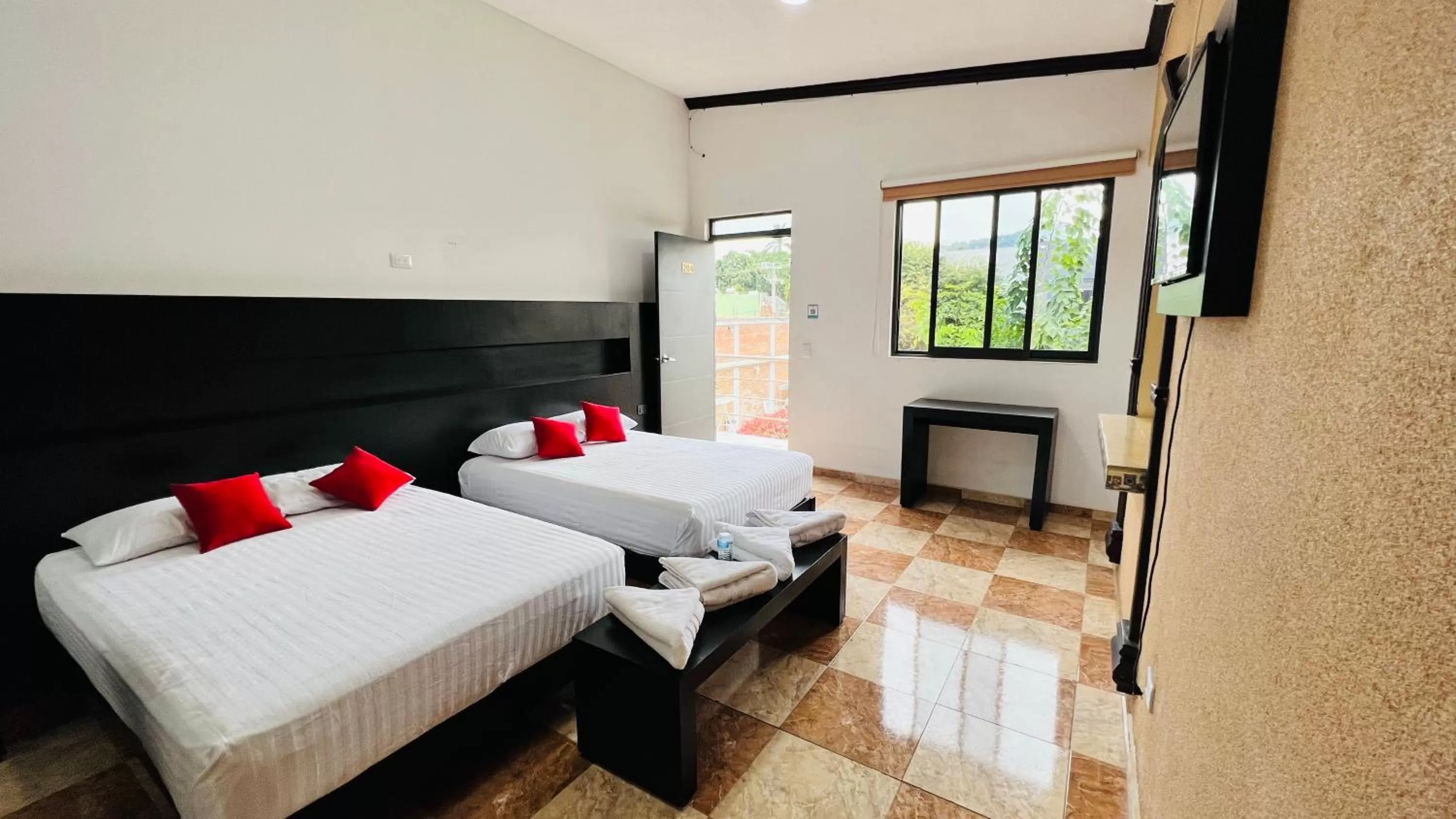 Bed in Hotel Villa Pralaya