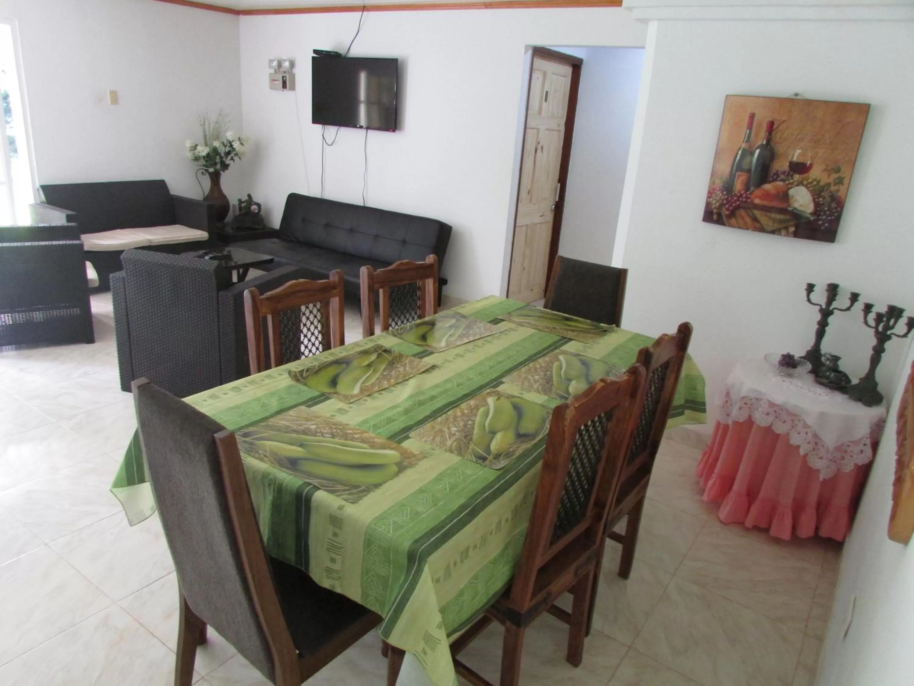 Communal lounge/ TV room, Seating Area in Posada Hostal Miss Marlly