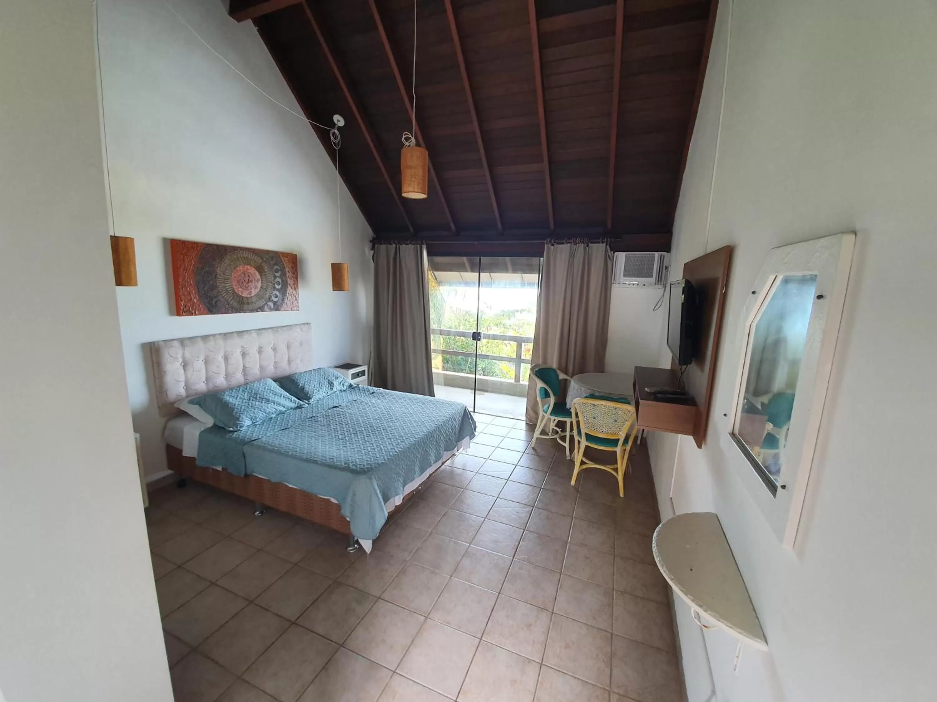 Photo of the whole room in Pousada Bangalôs Da Mole - Florianópolis