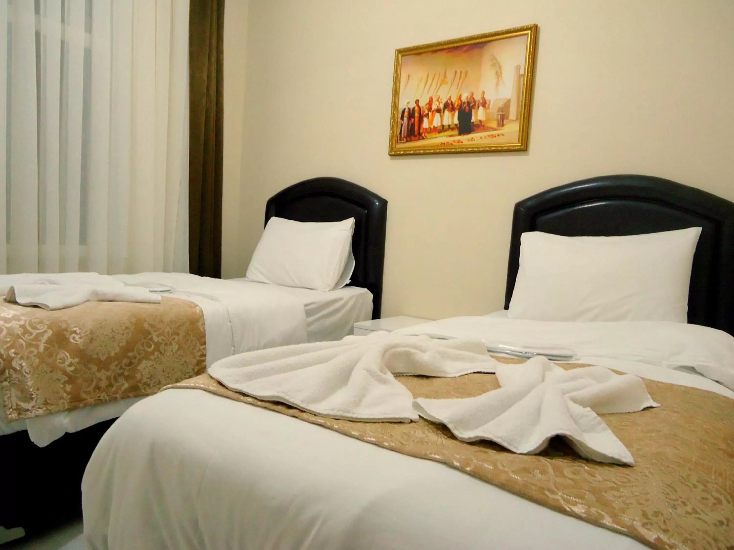 Photo of the whole room, Bed in Tolga Hotel