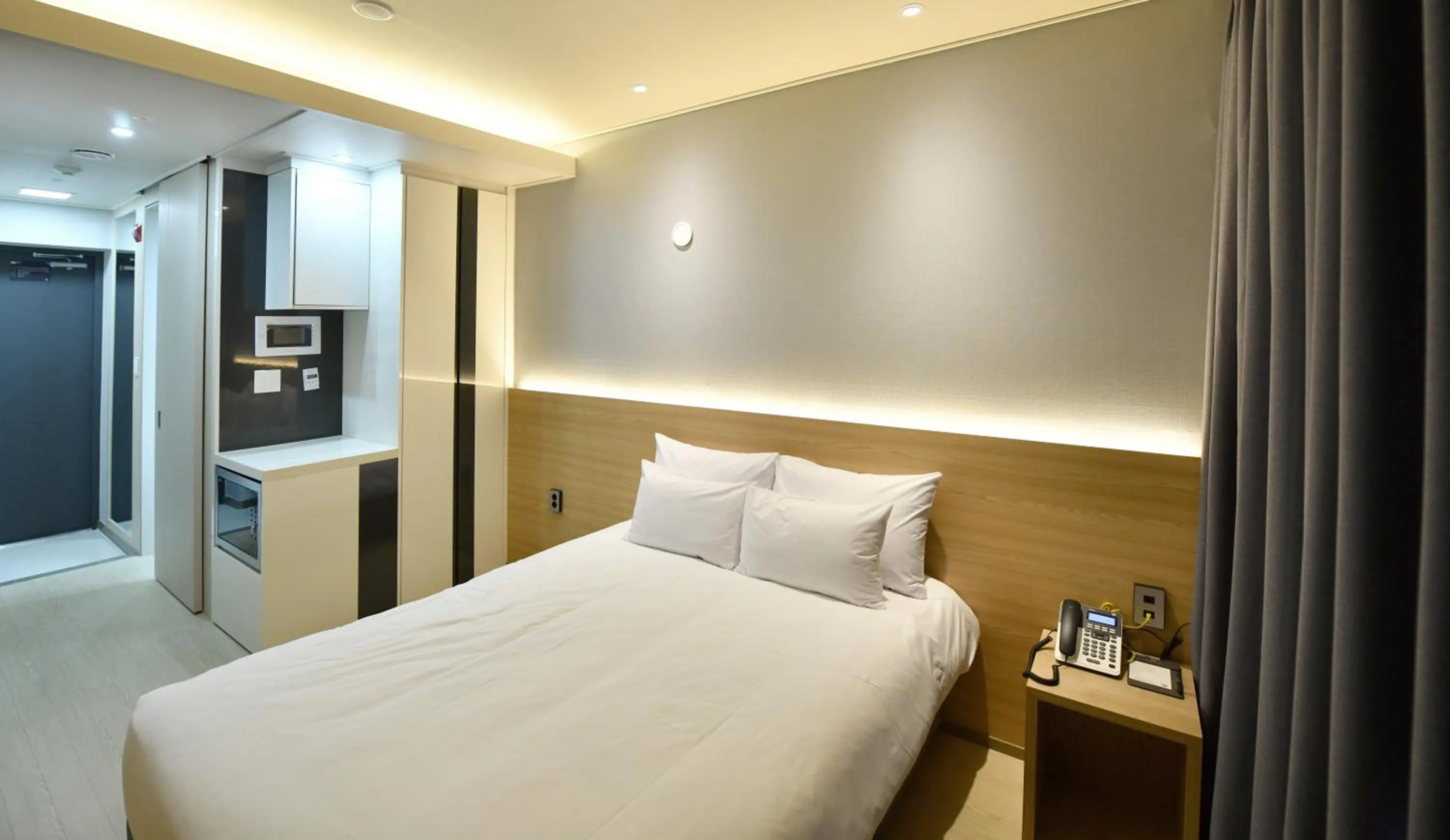 Bed in Ocean Soleview Hotel