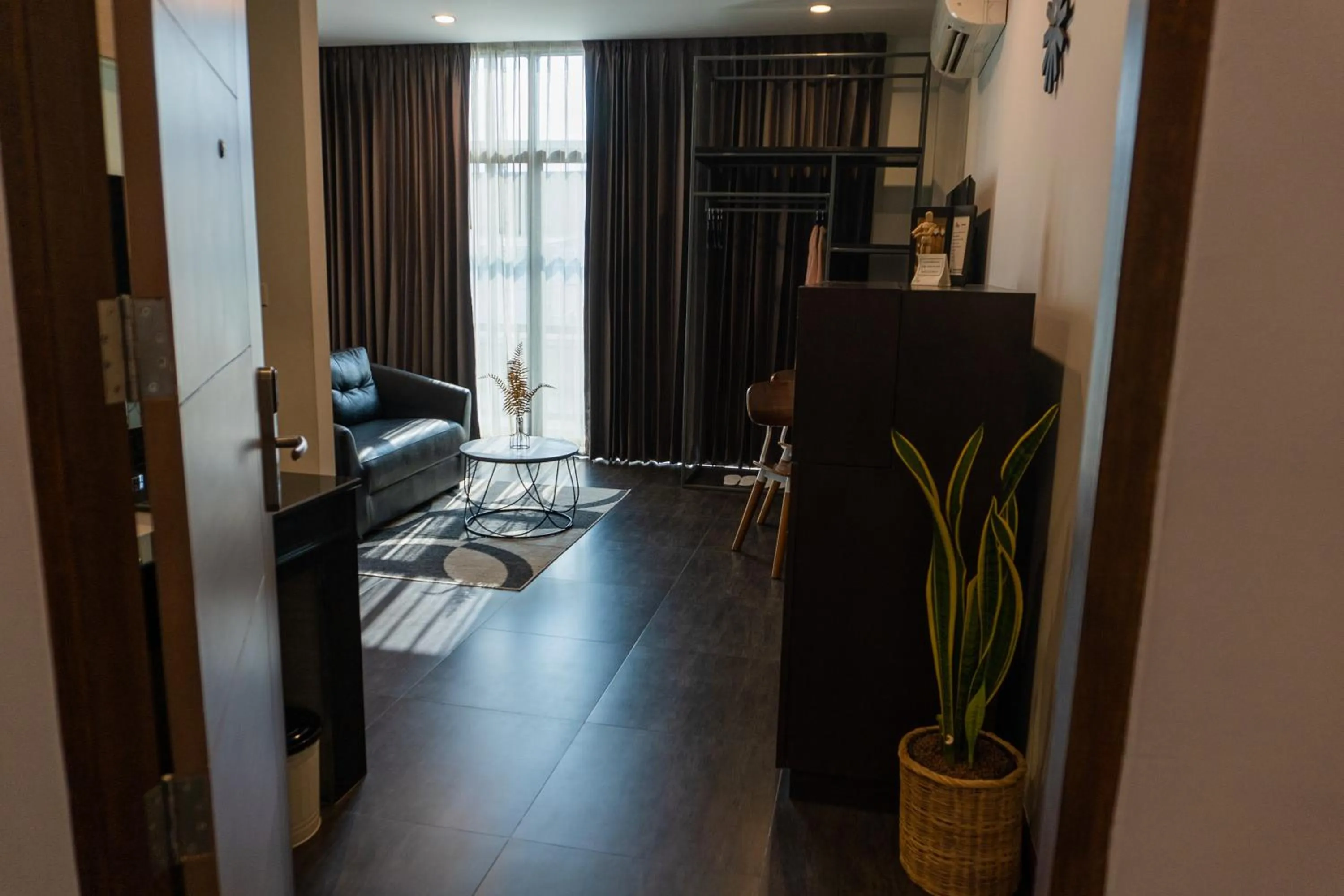 Living room in Wealth Boutique Hotel Chiang Mai