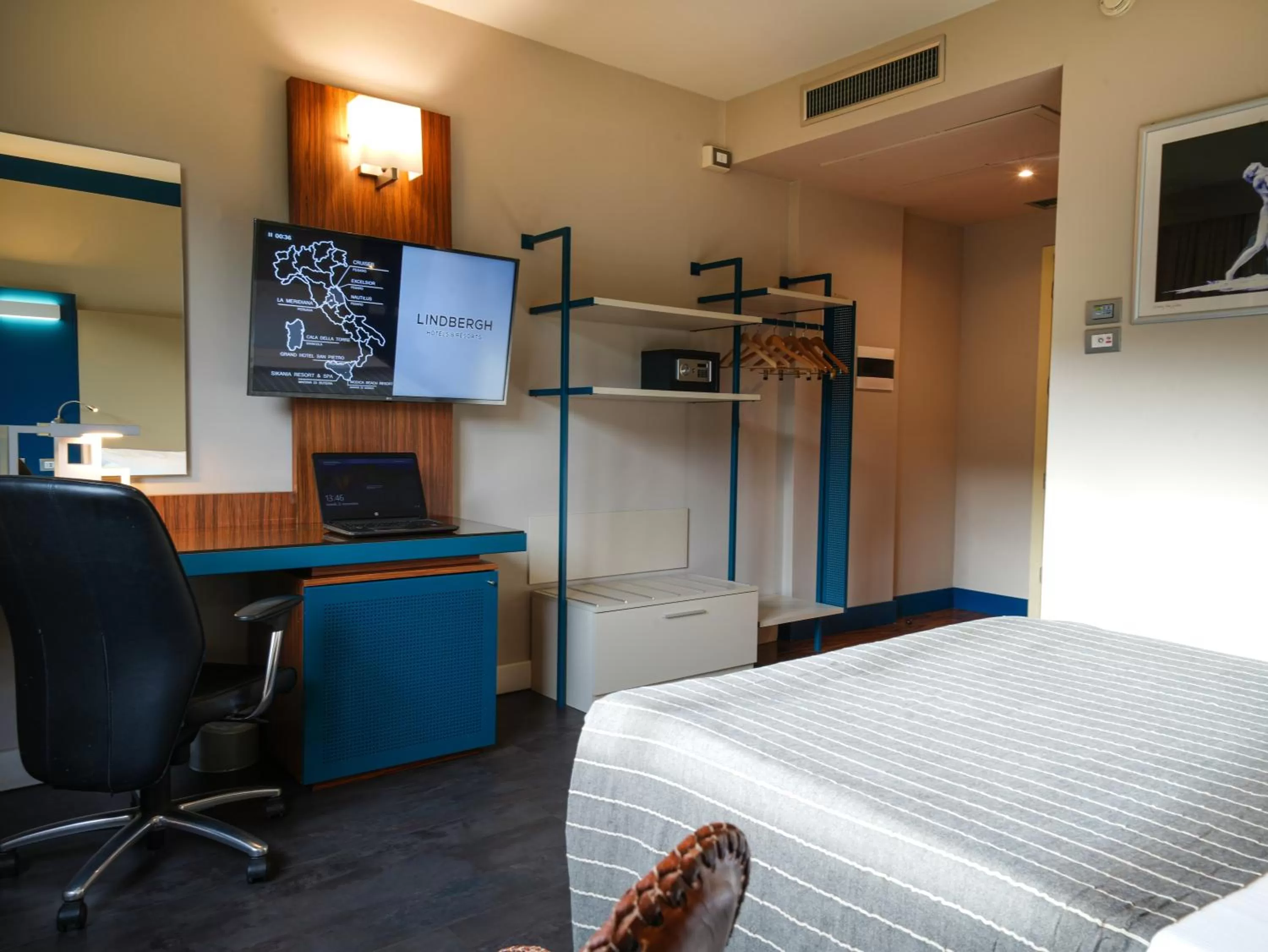 Bed in La Meridiana Bleisure Hotel