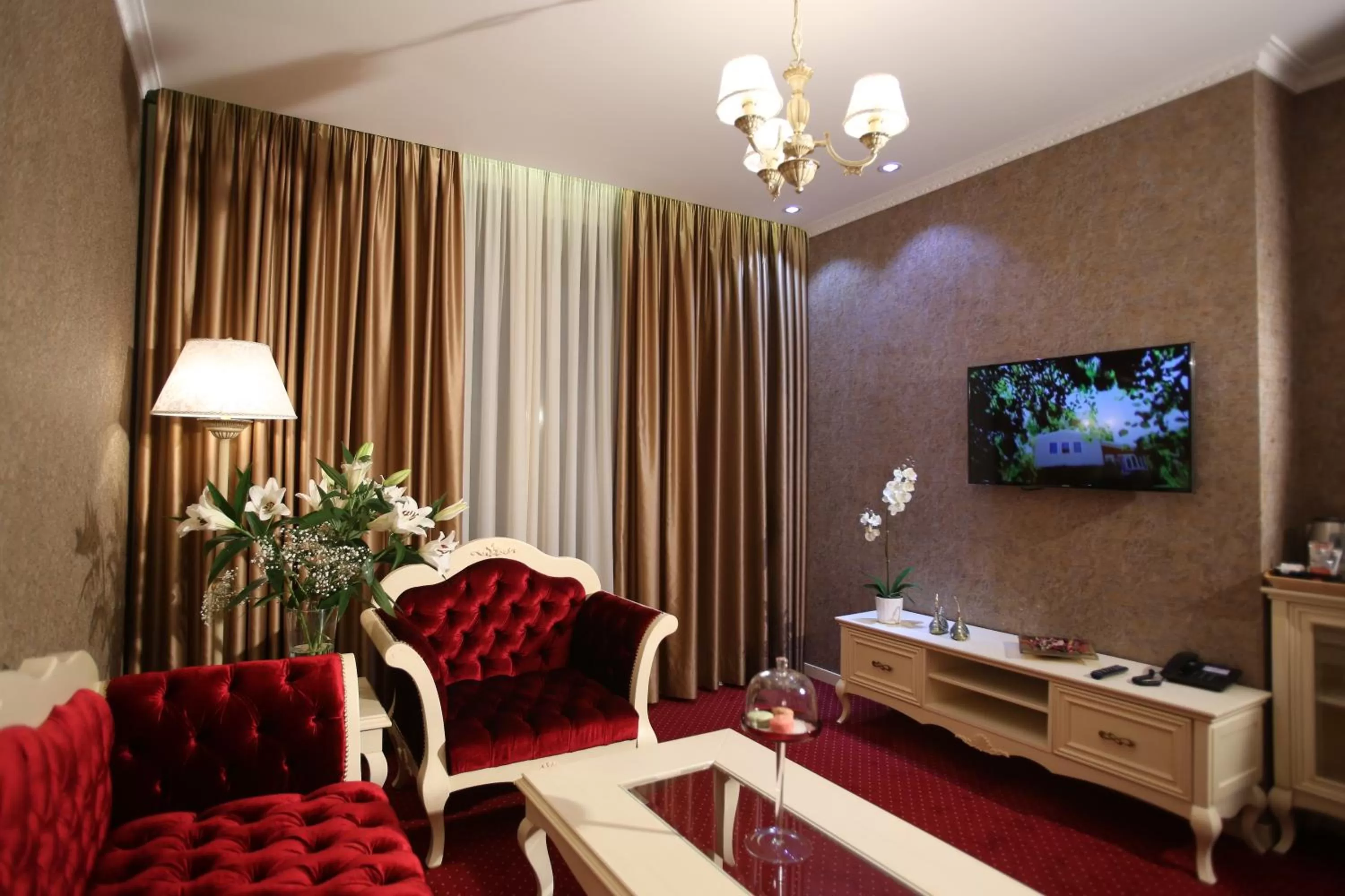 Communal lounge/ TV room in Grand Hotel & Spa Tirana