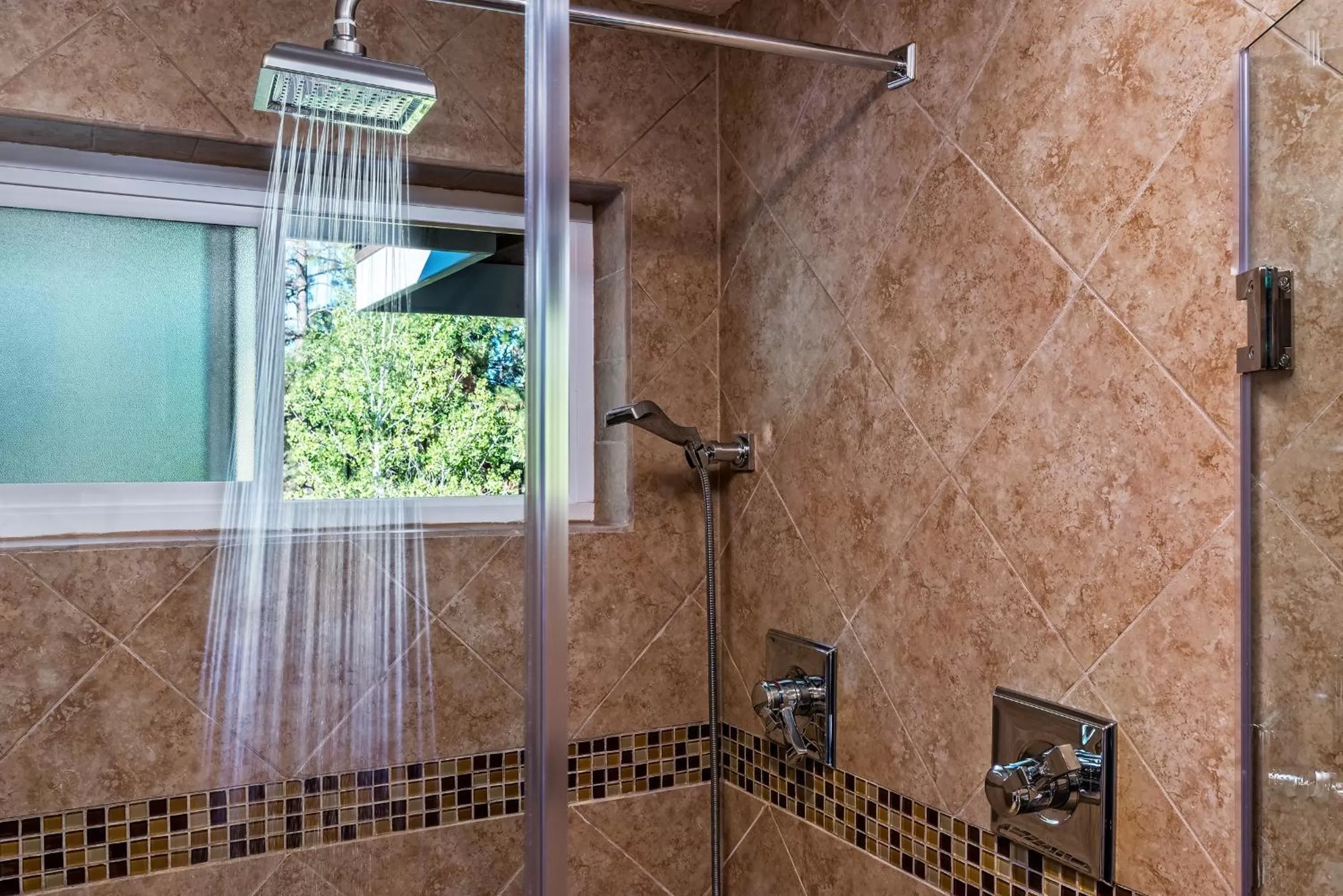 Shower in Sheridan House Inn- Adult Only Accommodation