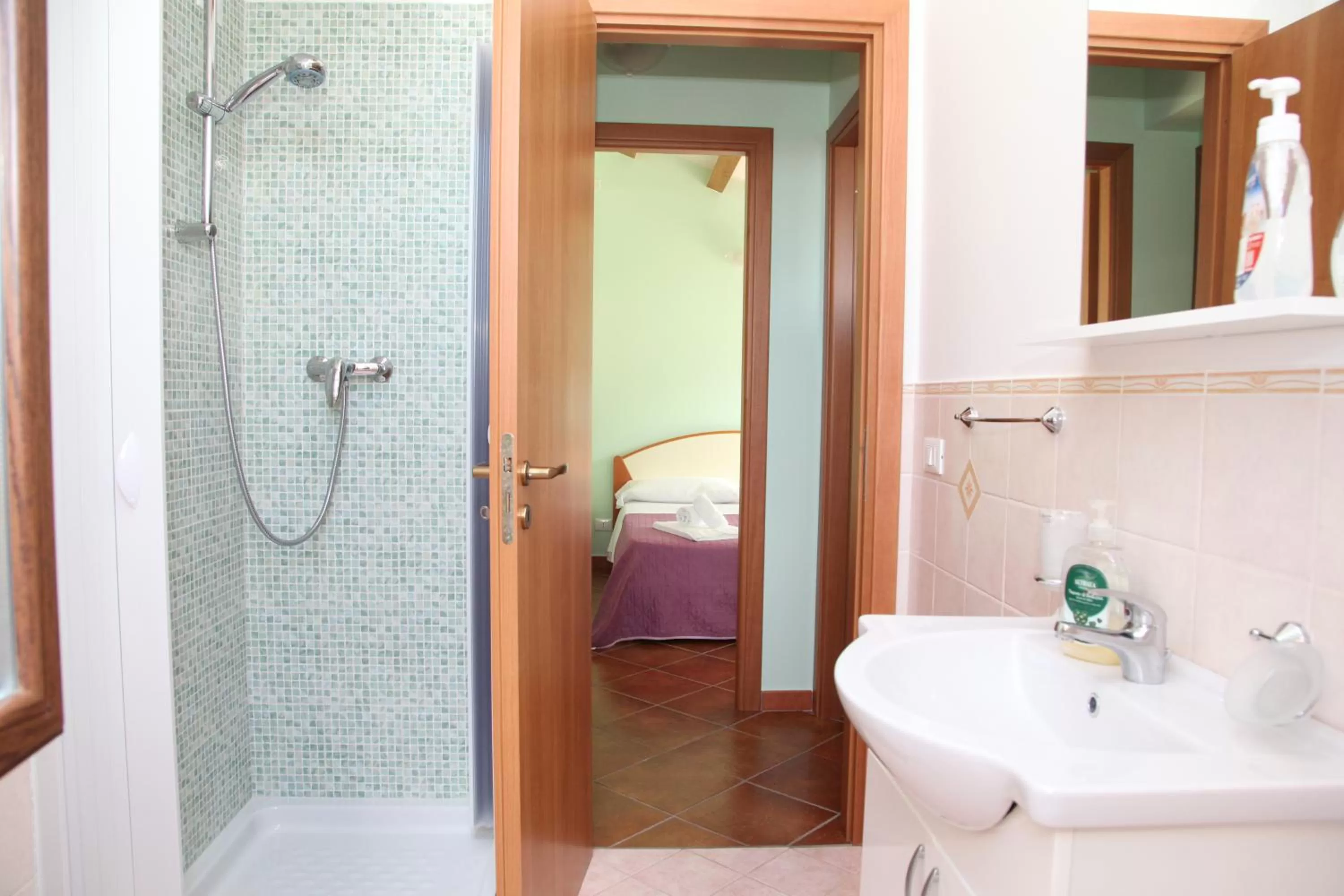 Bathroom, Bed in Appartamenti Anzà