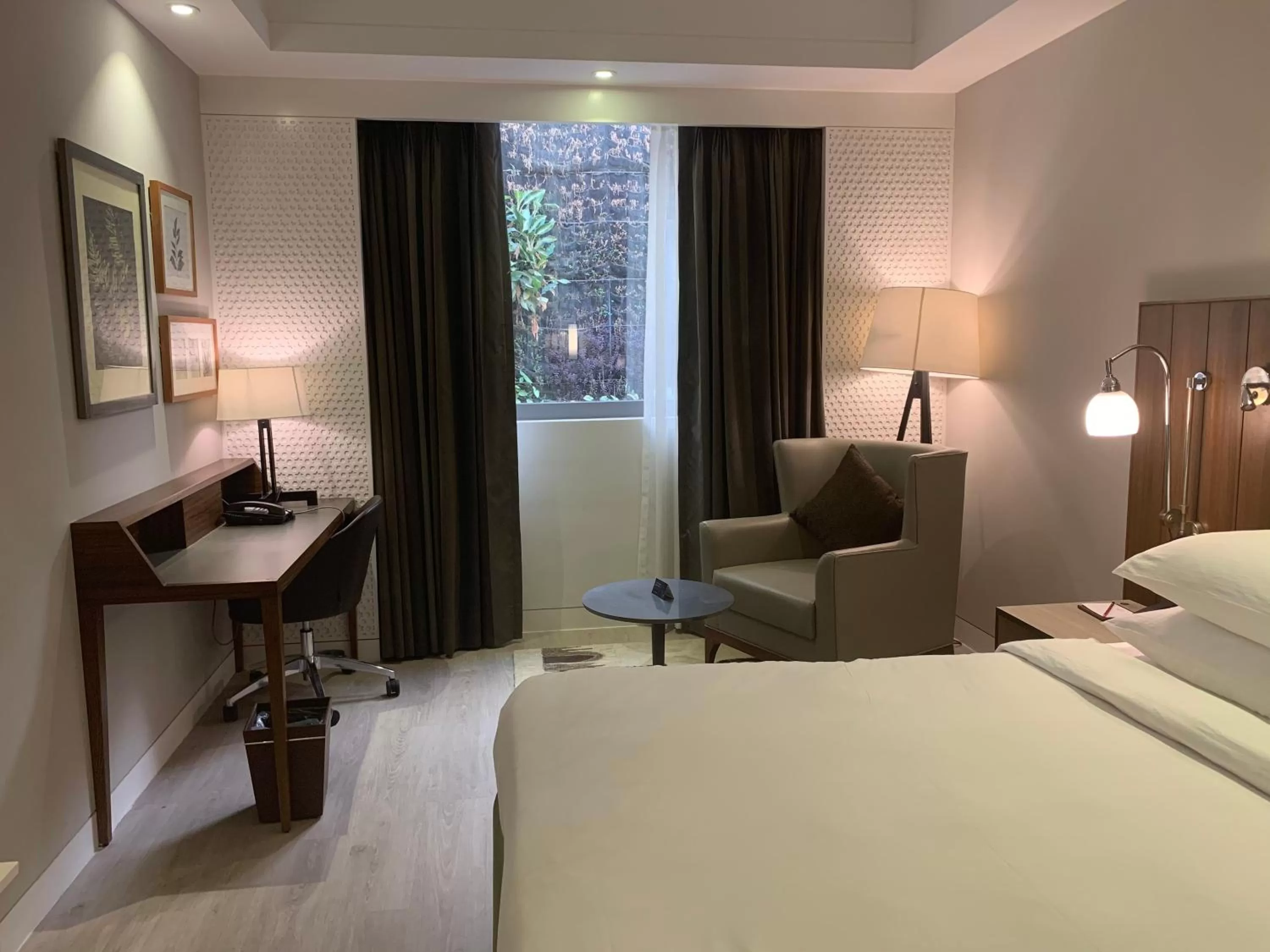 Seating area, Bed in Country Inn & Suites by Radisson Chandigarh Zirakpur