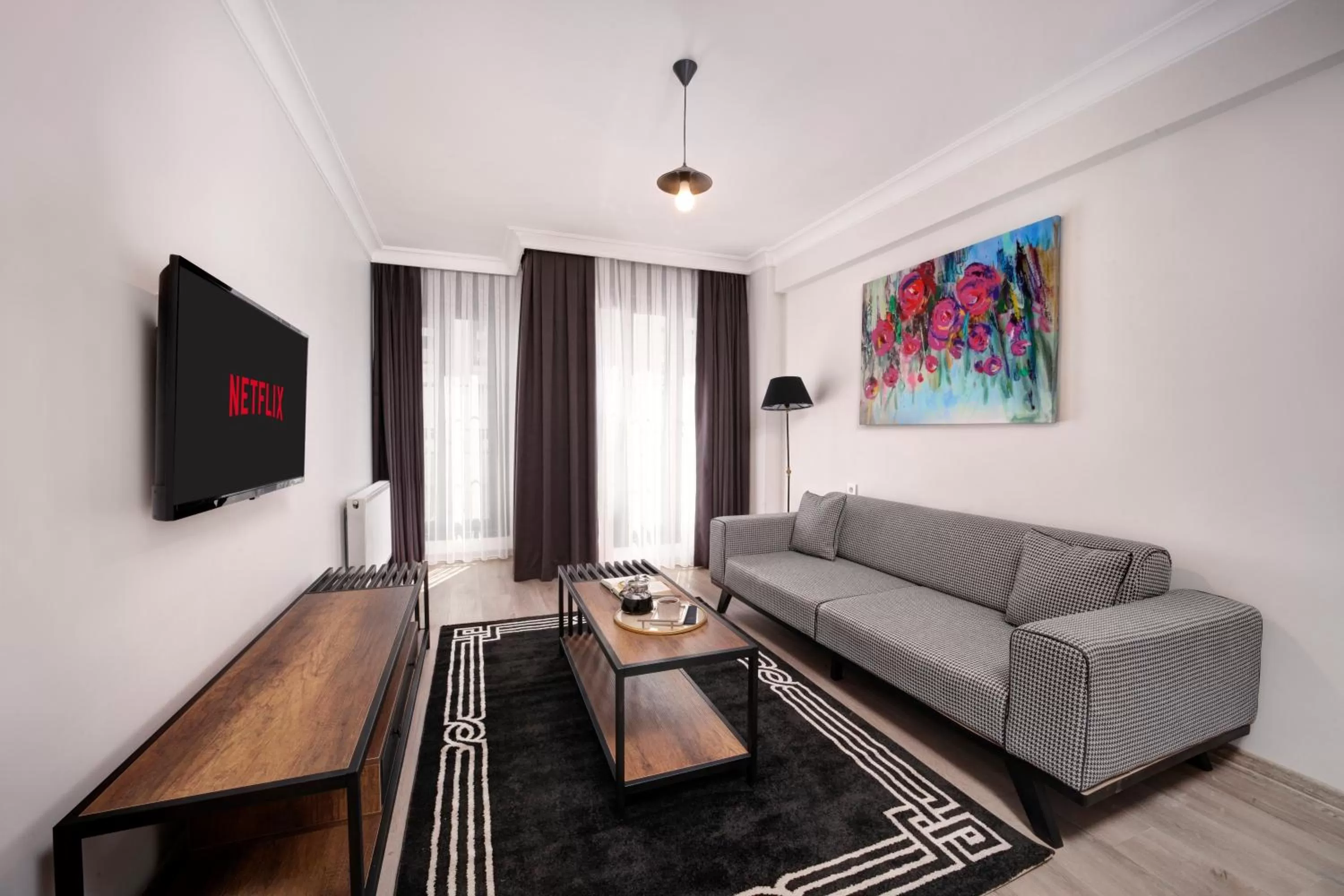 Communal lounge/ TV room in Etiz Hotels & Residences