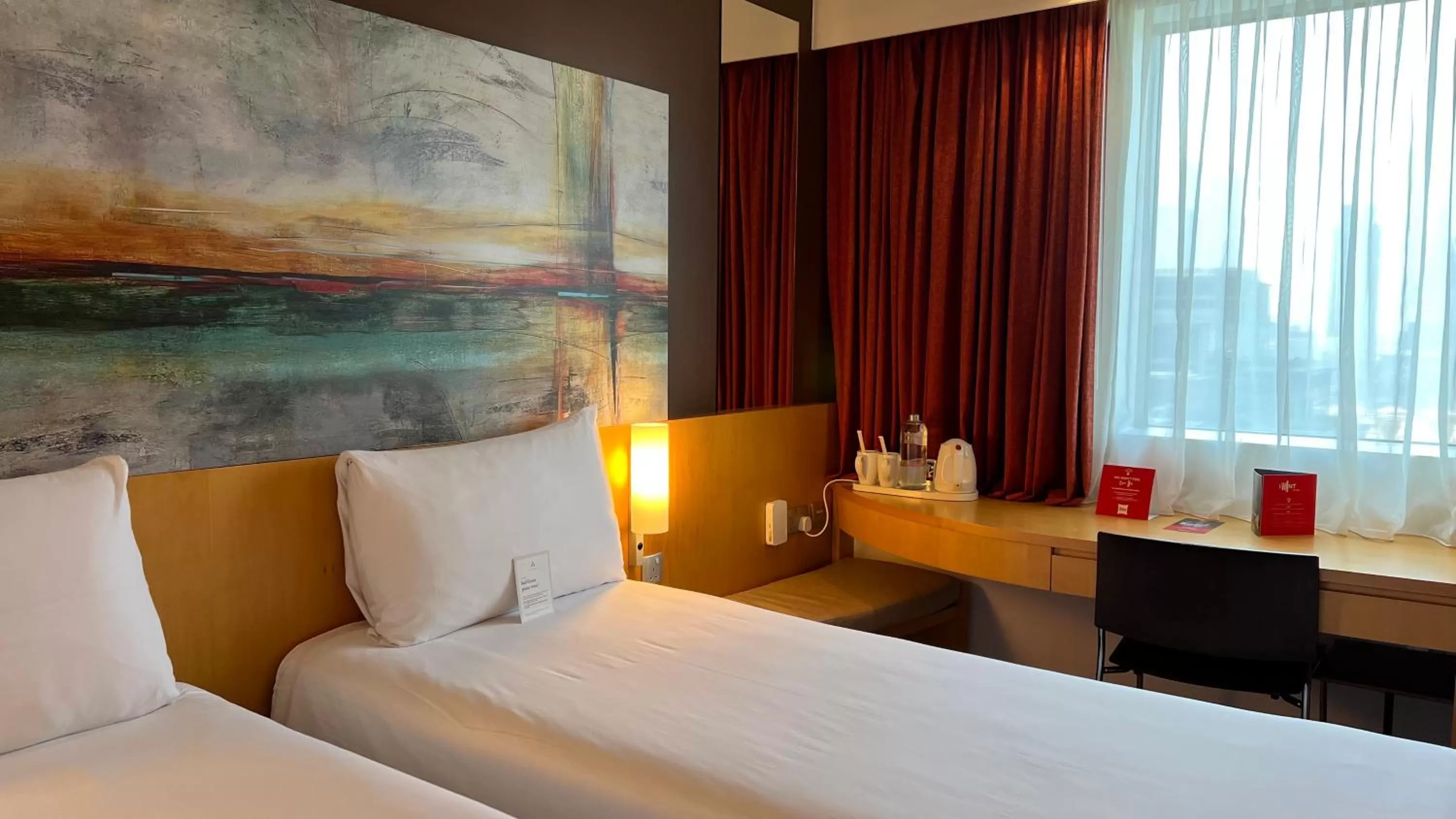 Seating area, Bed in ibis Dubai One Central