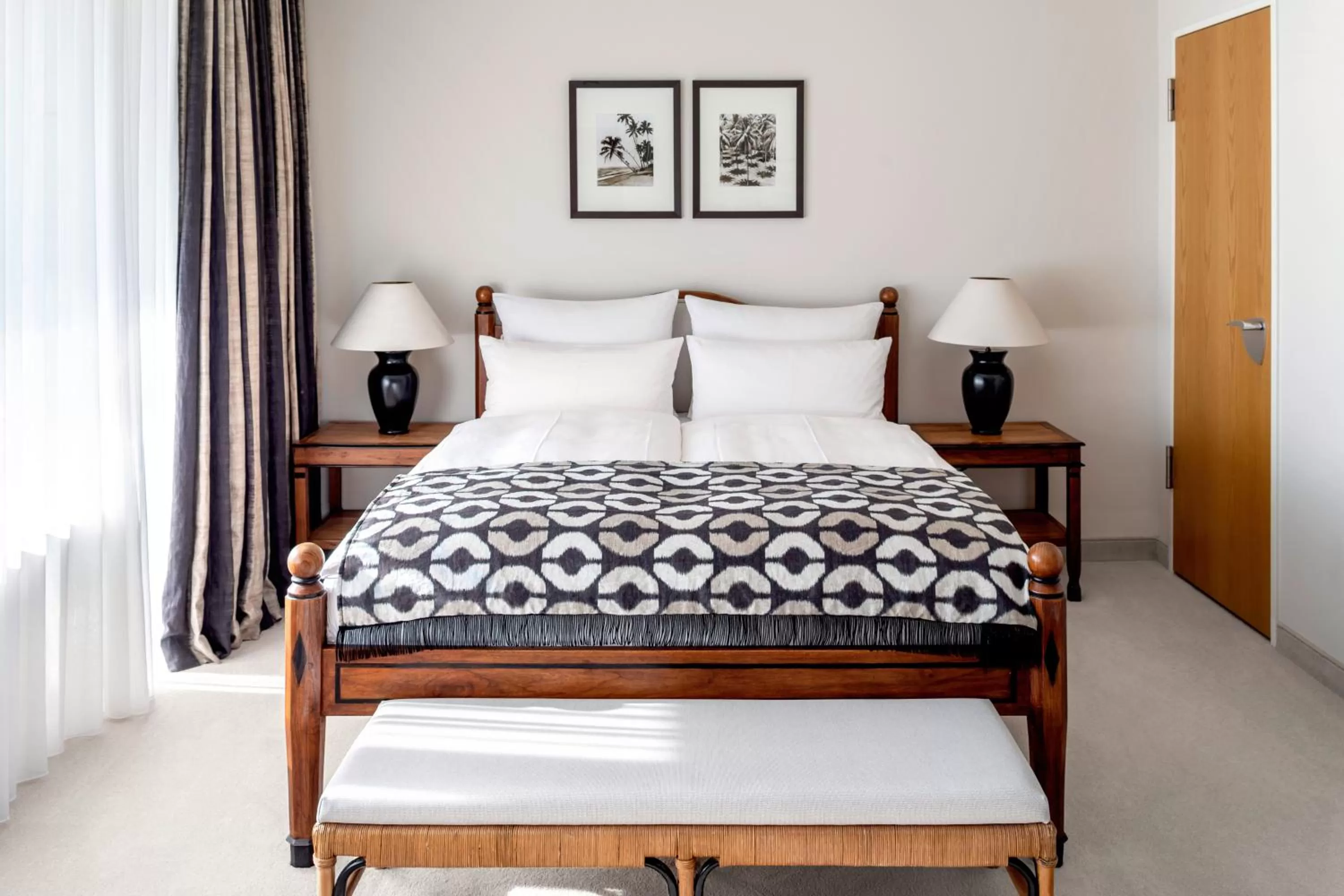 Bed in The Mandala Suites