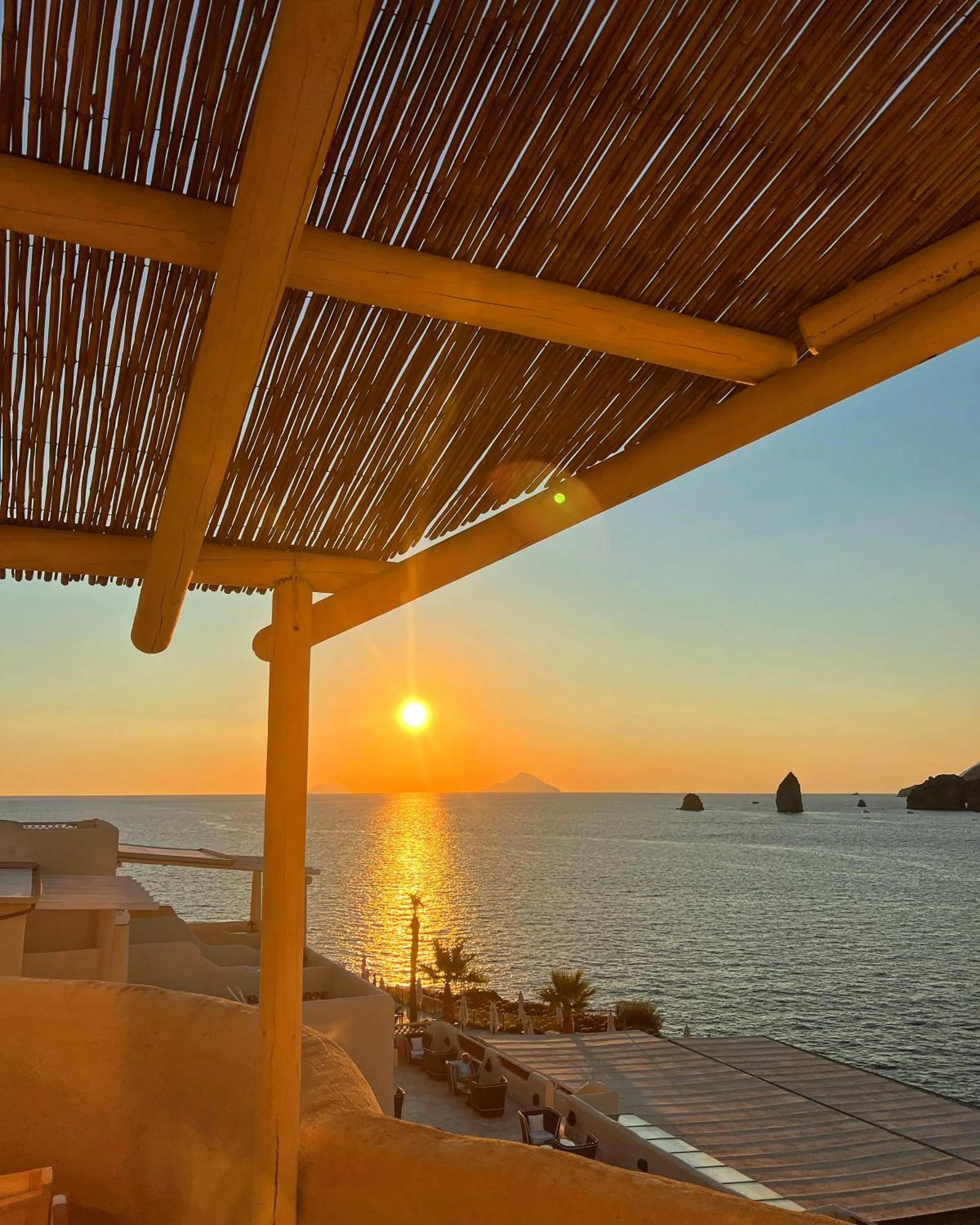 Patio in Therasia Resort Sea and SPA - The Leading Hotels of the World