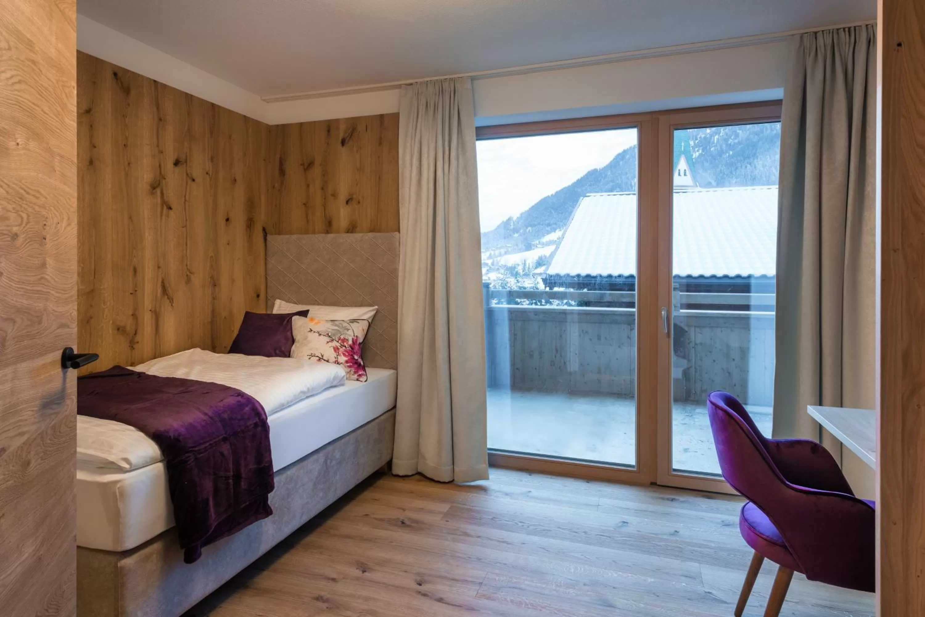 Photo of the whole room, Bed in Boutiquehotel die Alpbacherin 4 Sterne Superior
