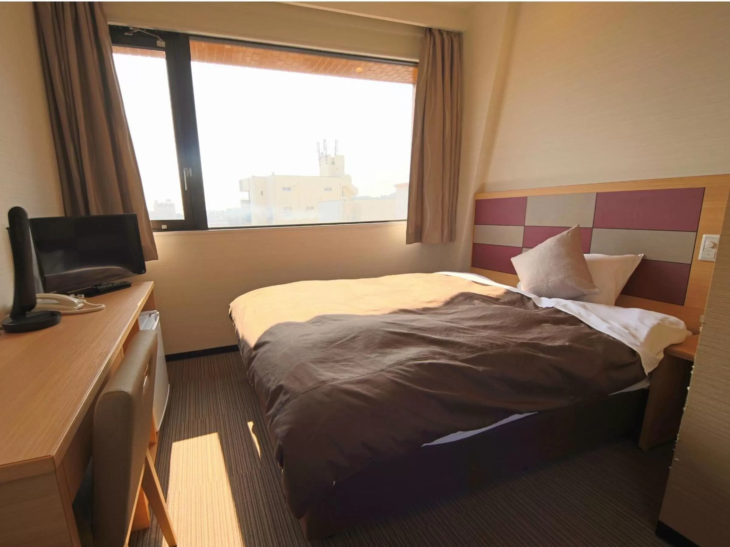 Bed in Hotel Sun Road