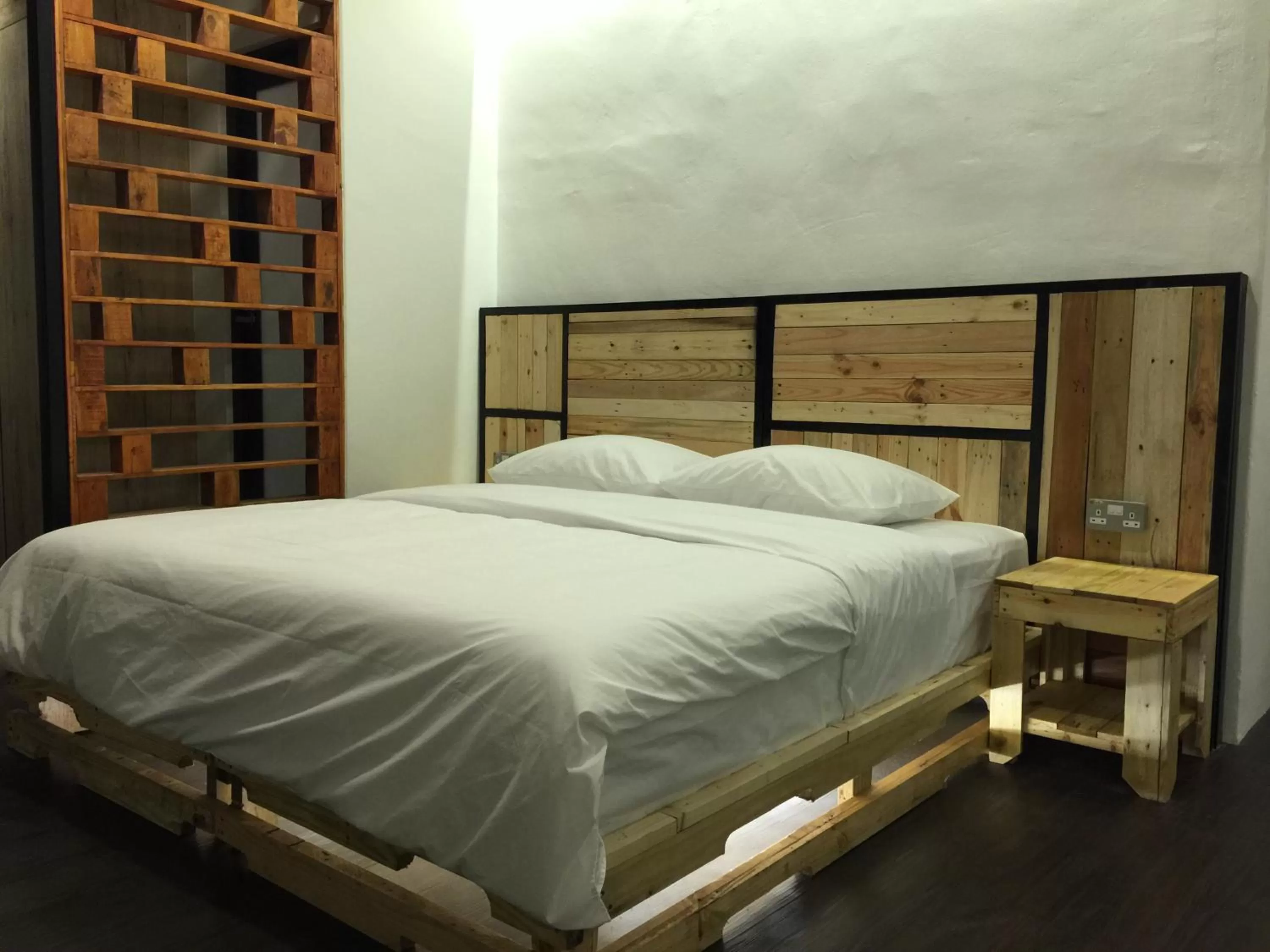 Bed in The Oikos Hotel
