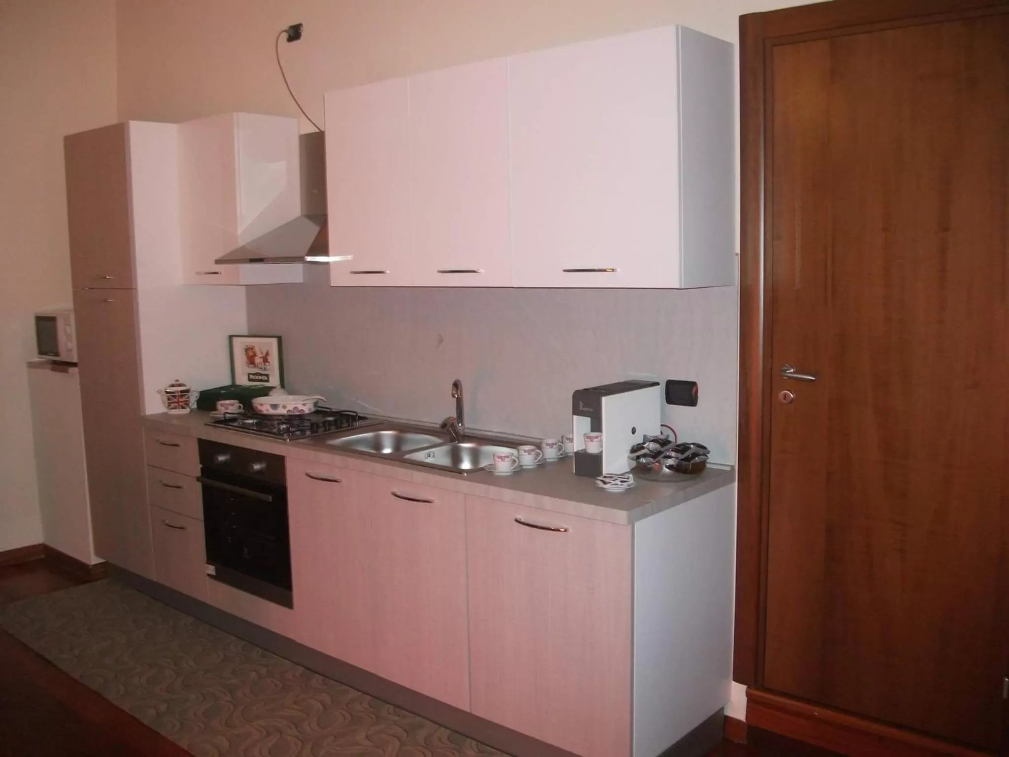 Kitchen or kitchenette in Dimora di Mara