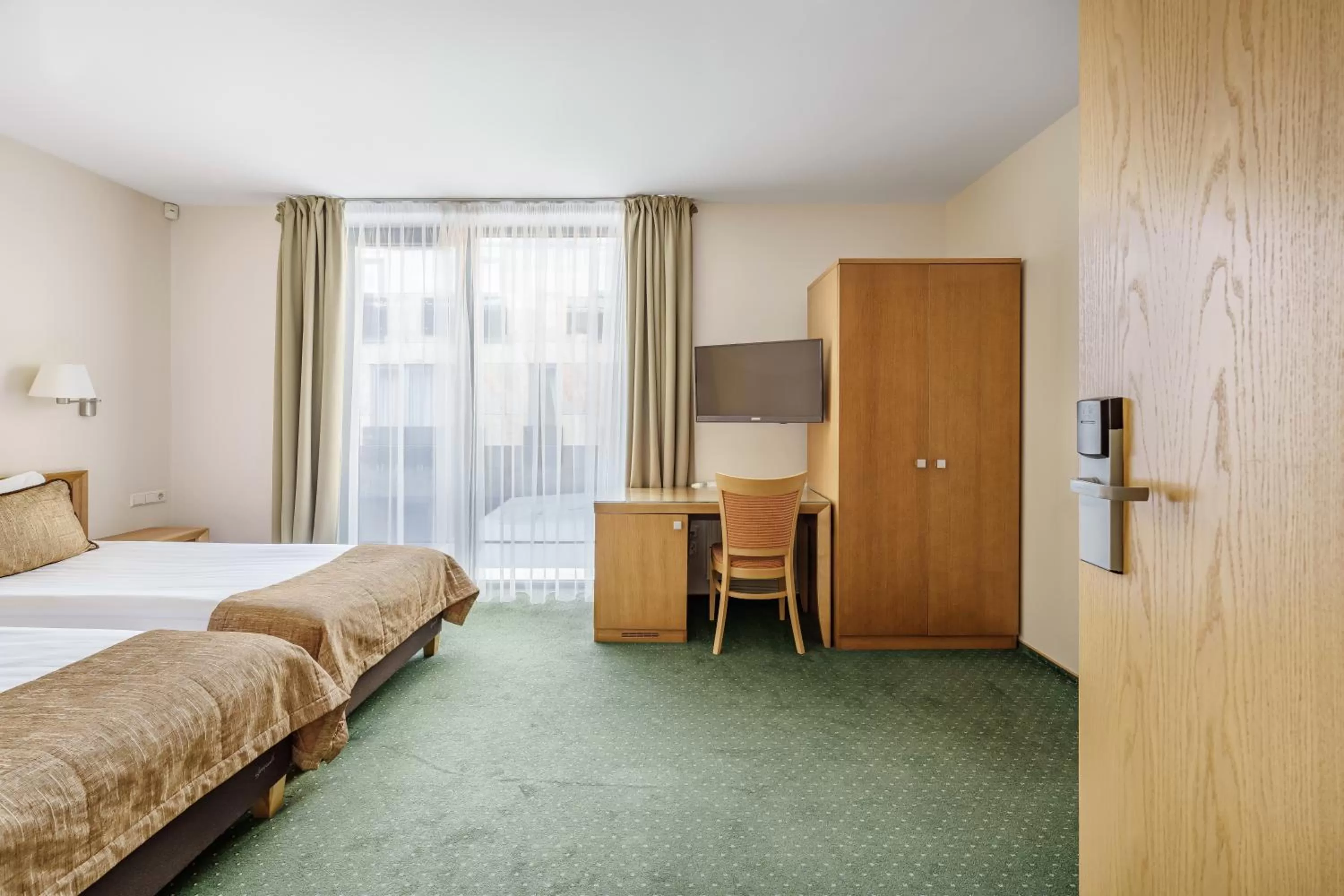 Bed in Euterpe Hotel