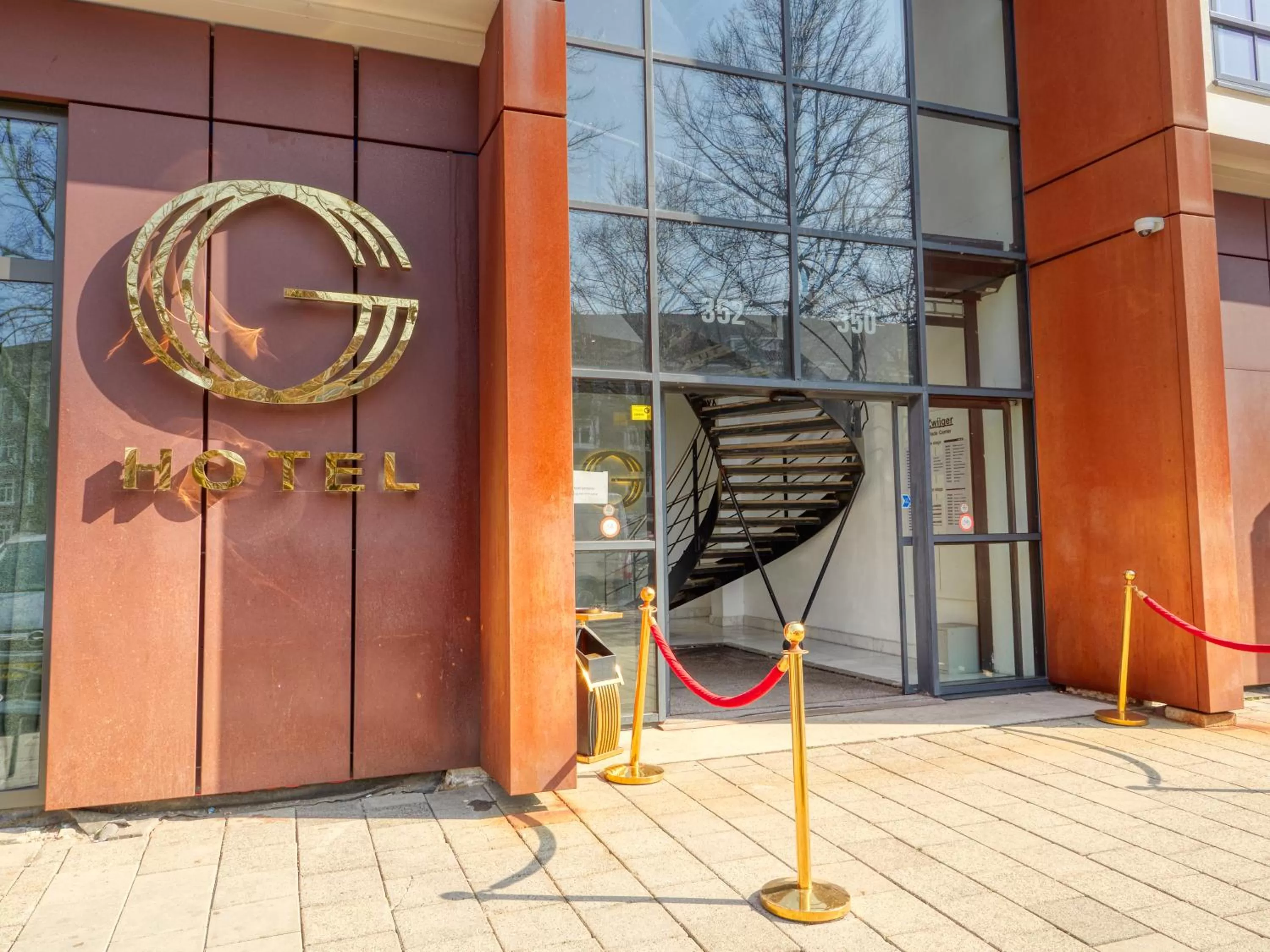 Property logo or sign in Triple G Hotels