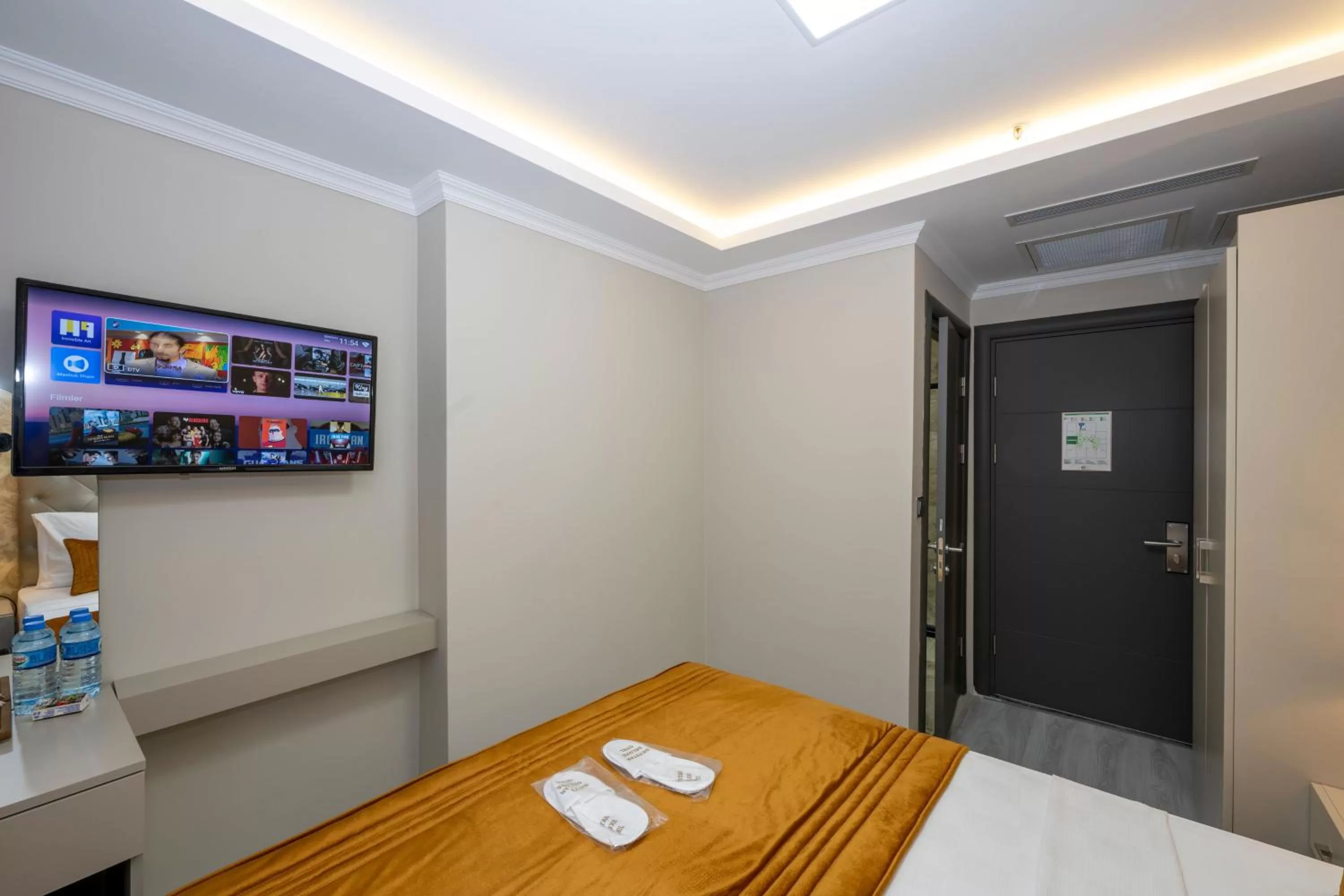 Bed in SKYSTAR DELUXE HOTEL