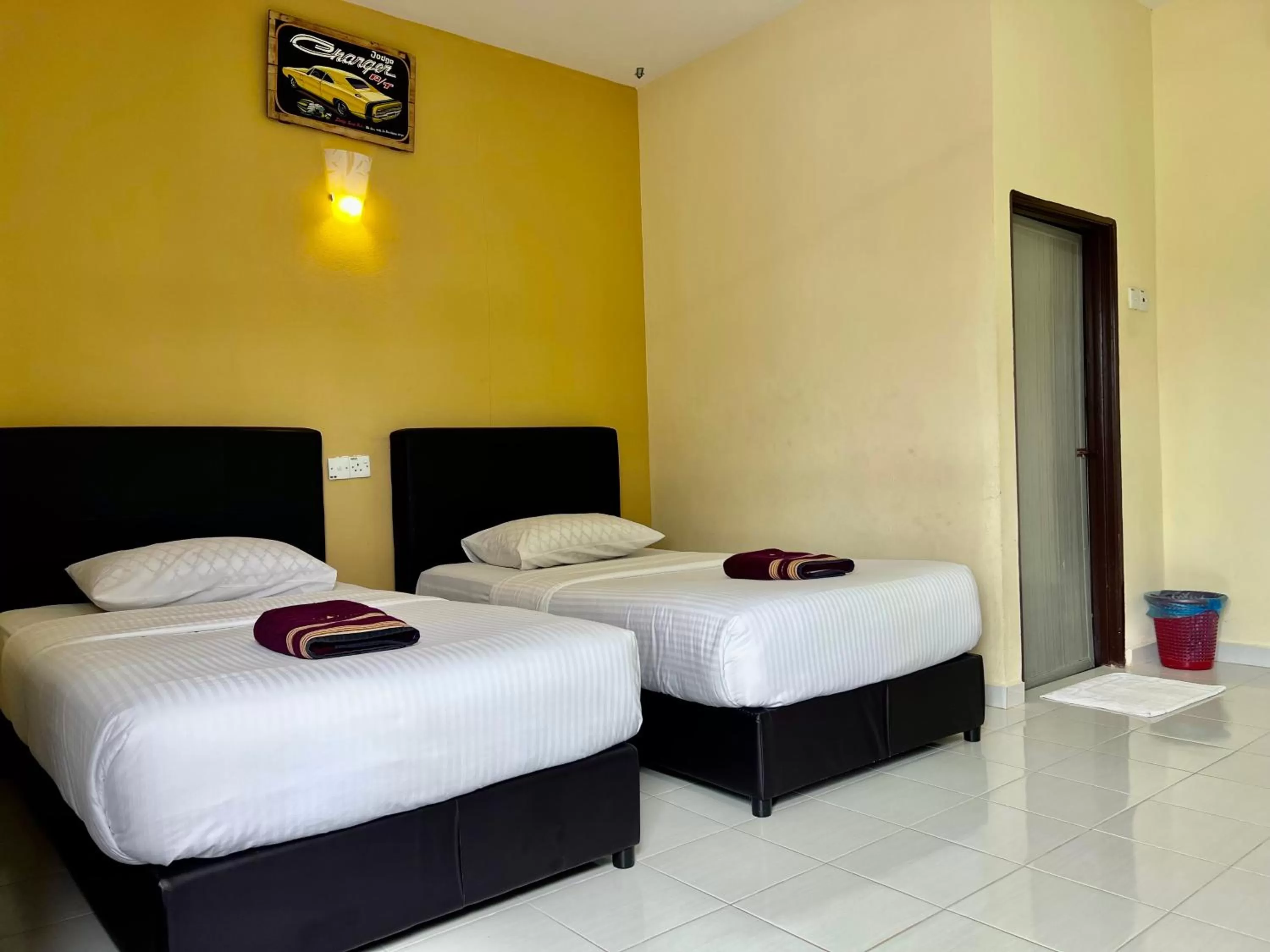 Bed in Dhania Cenang Beach Motel