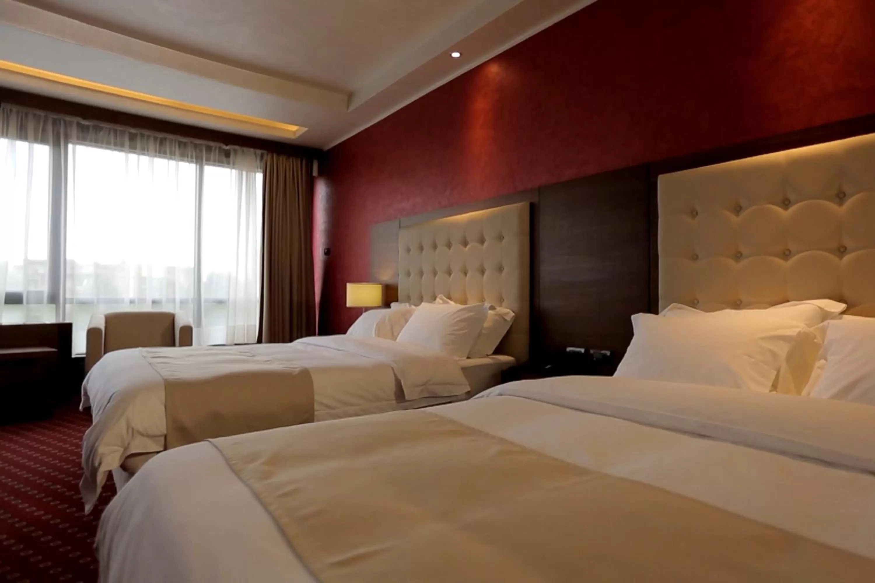 Bed in Orbis Design Hotel & Spa