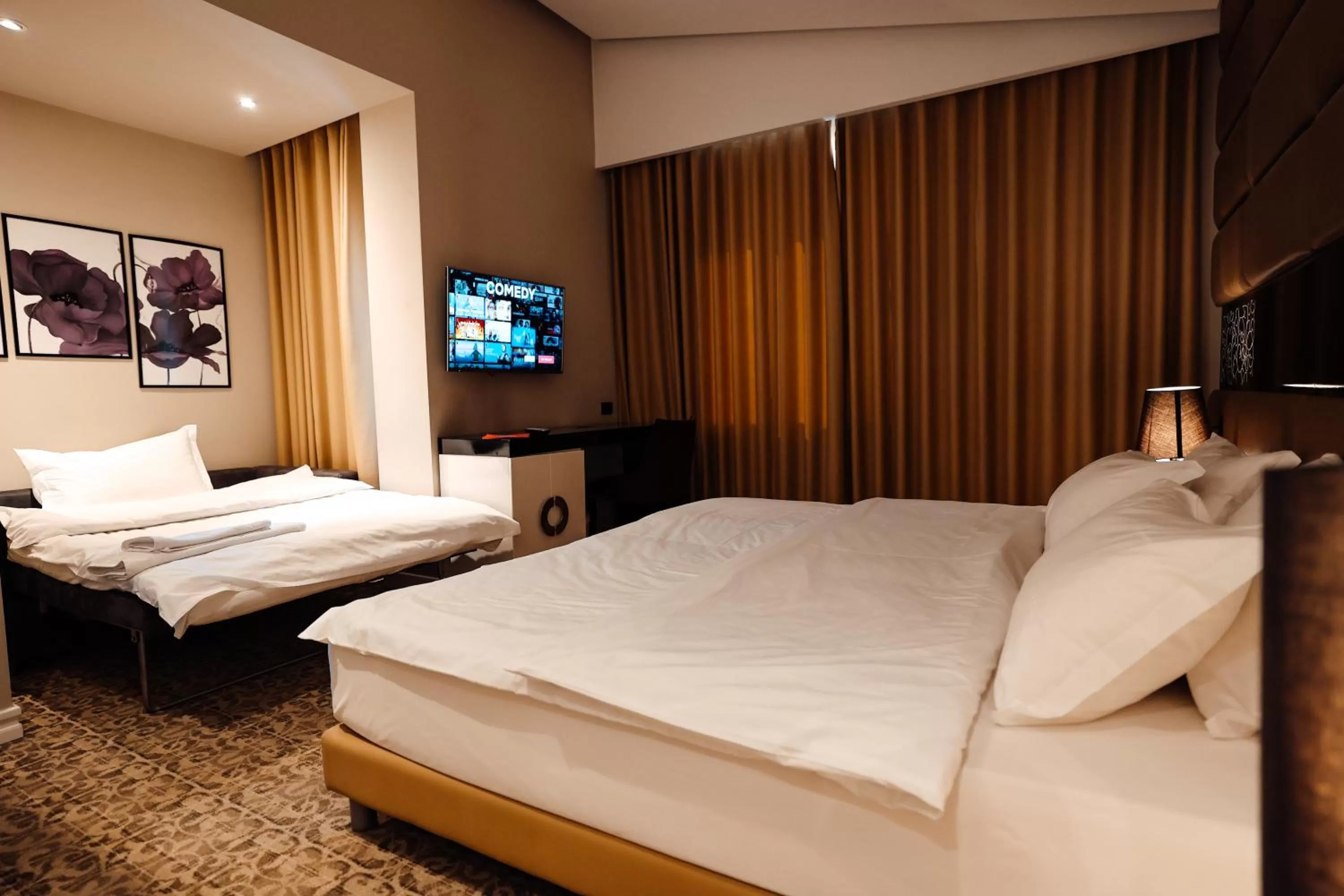 Bed in Senator Hotel