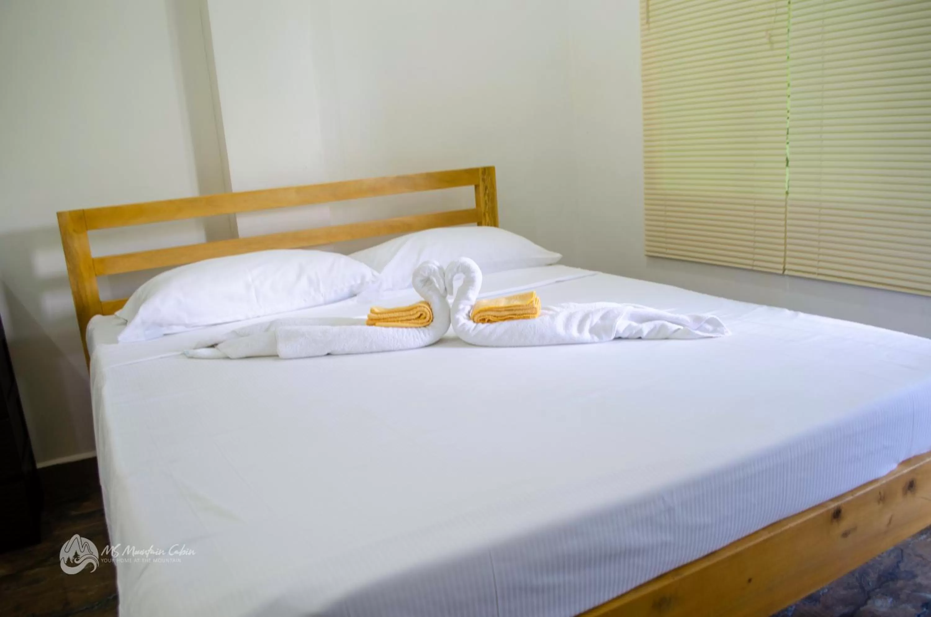 Bed in MS Mountain Cabin