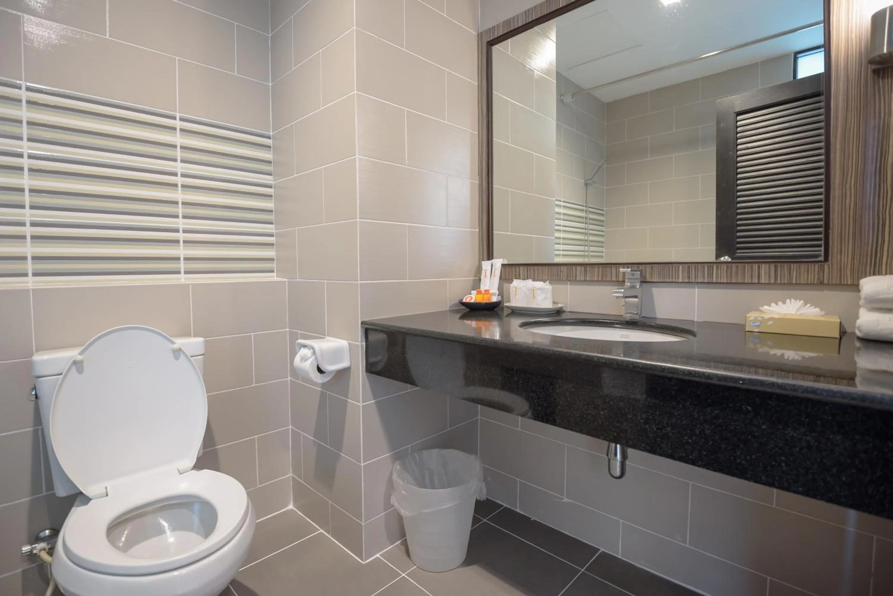 Bathroom in Hotel J Residence Pattaya