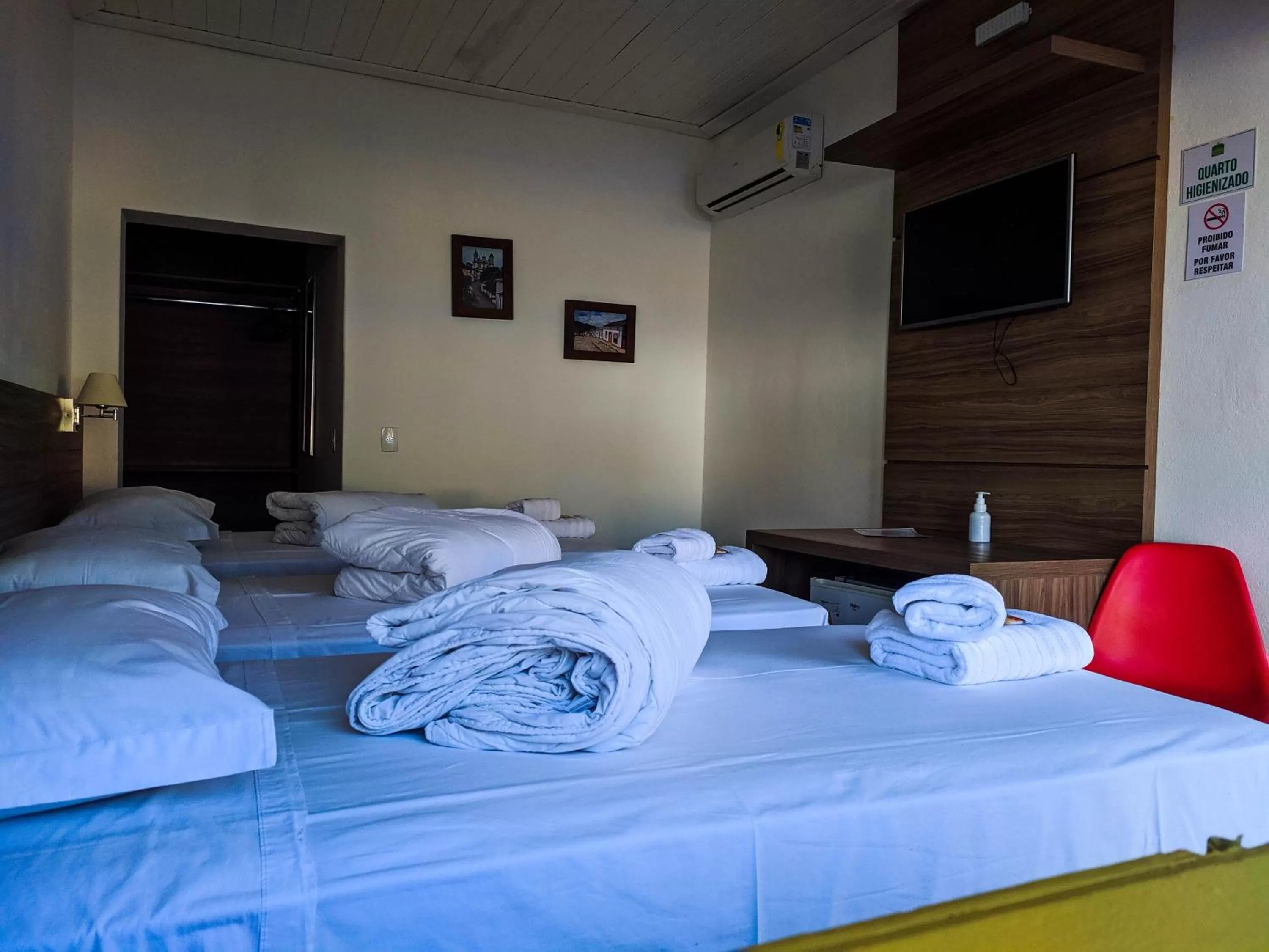 Bed in Pousada o Amanhecer