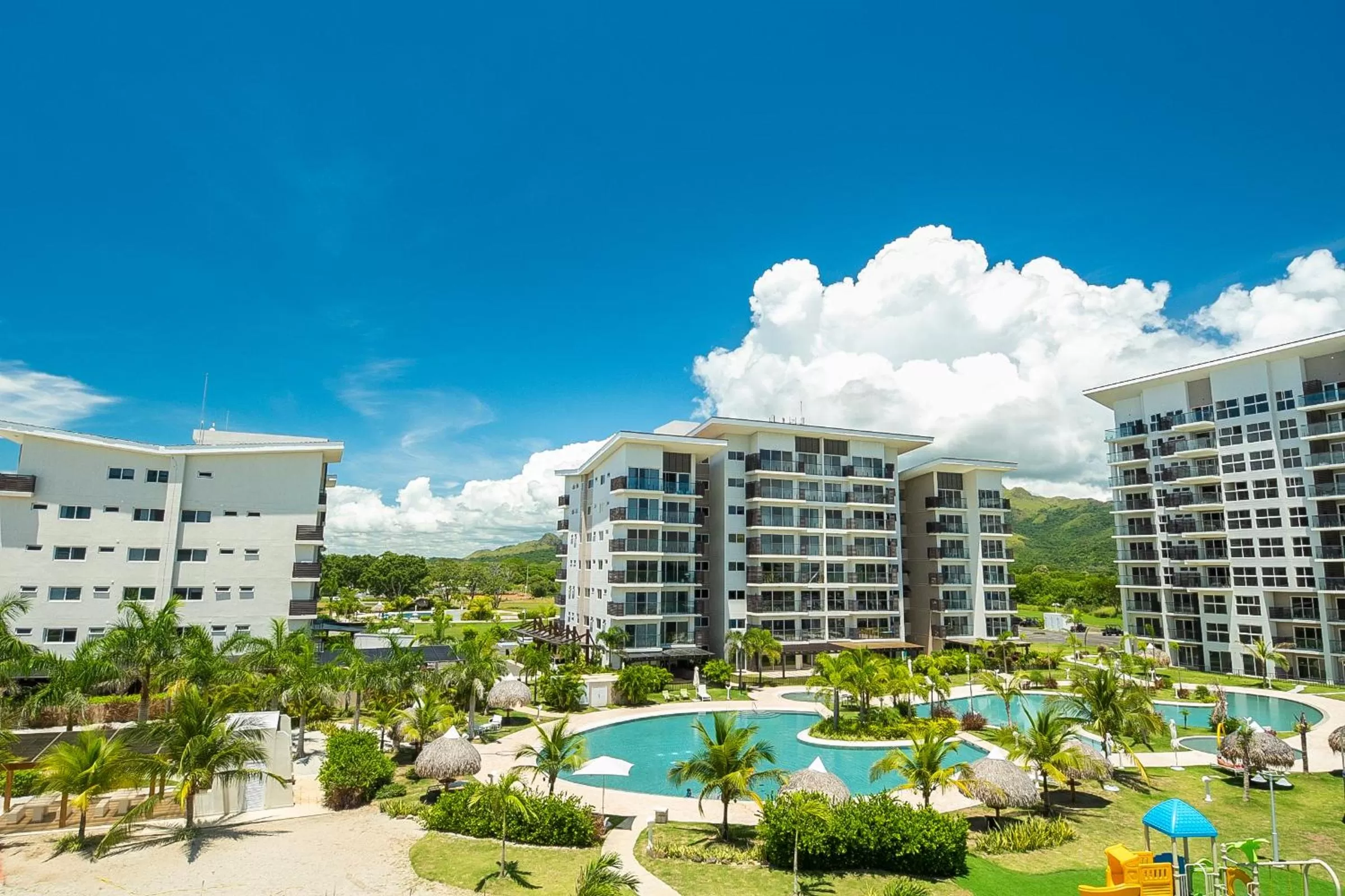 Garden, Pool View in Playa Caracol Residences