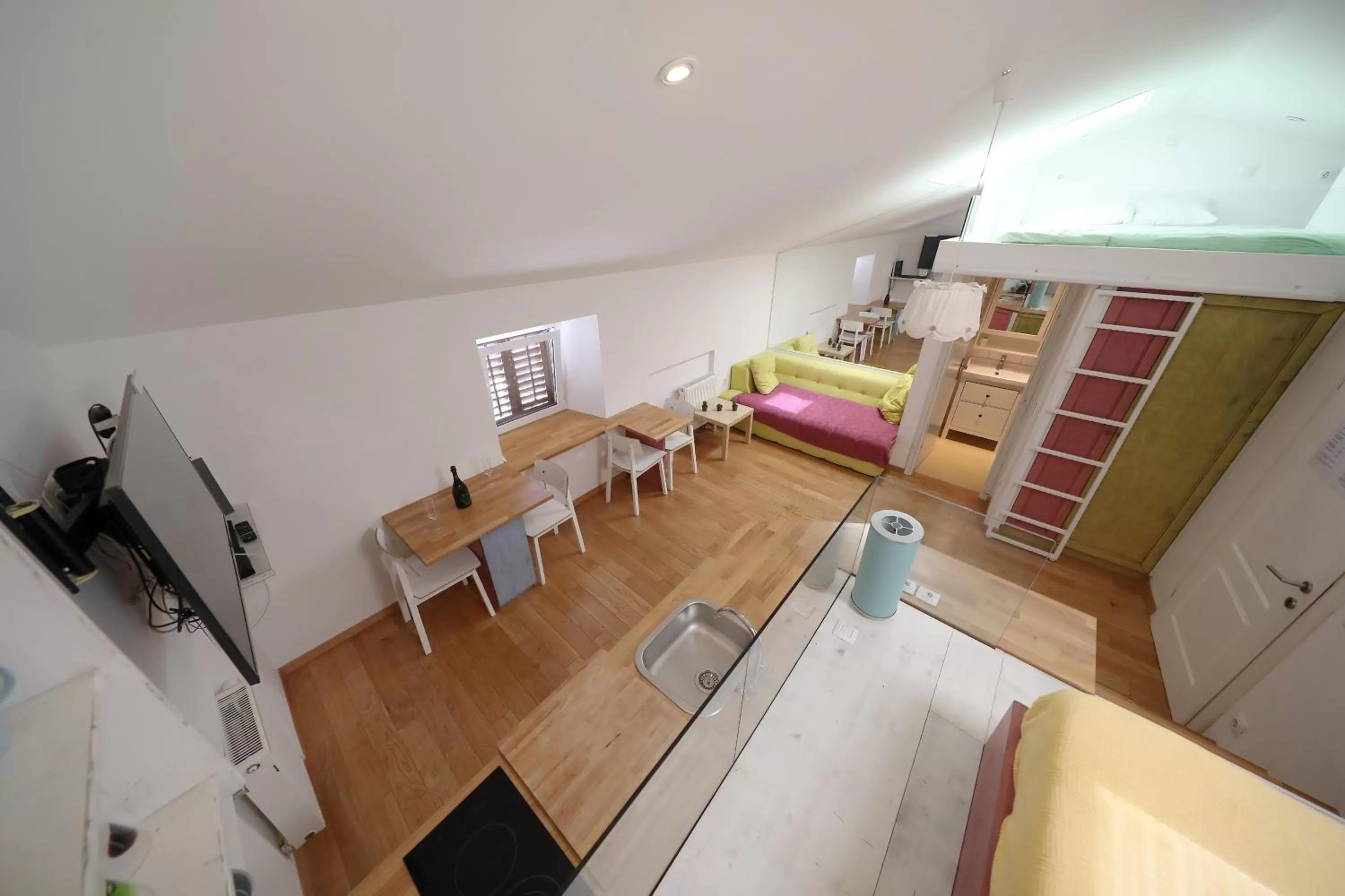 Kitchen or kitchenette, Bed in Central Apartments Integrated Hotel