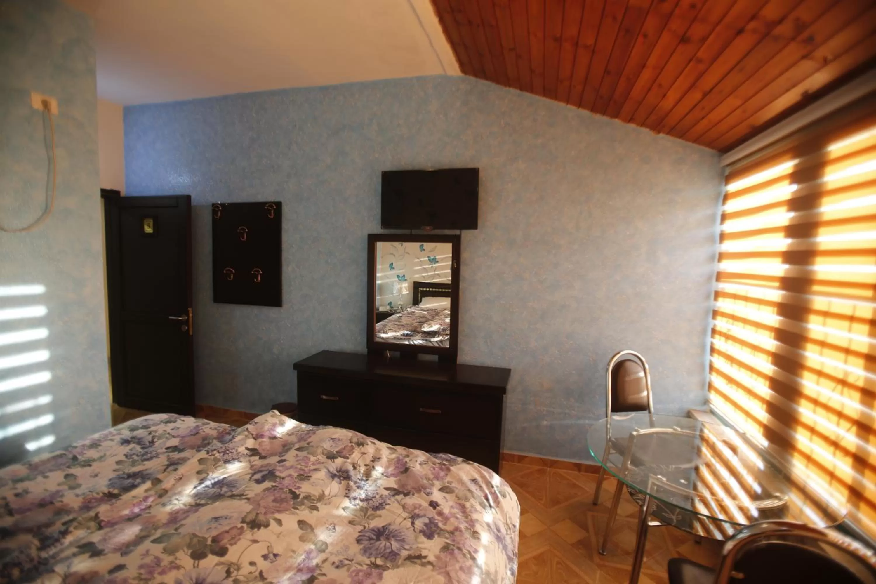 Toilet, Bed in Isra Hotel