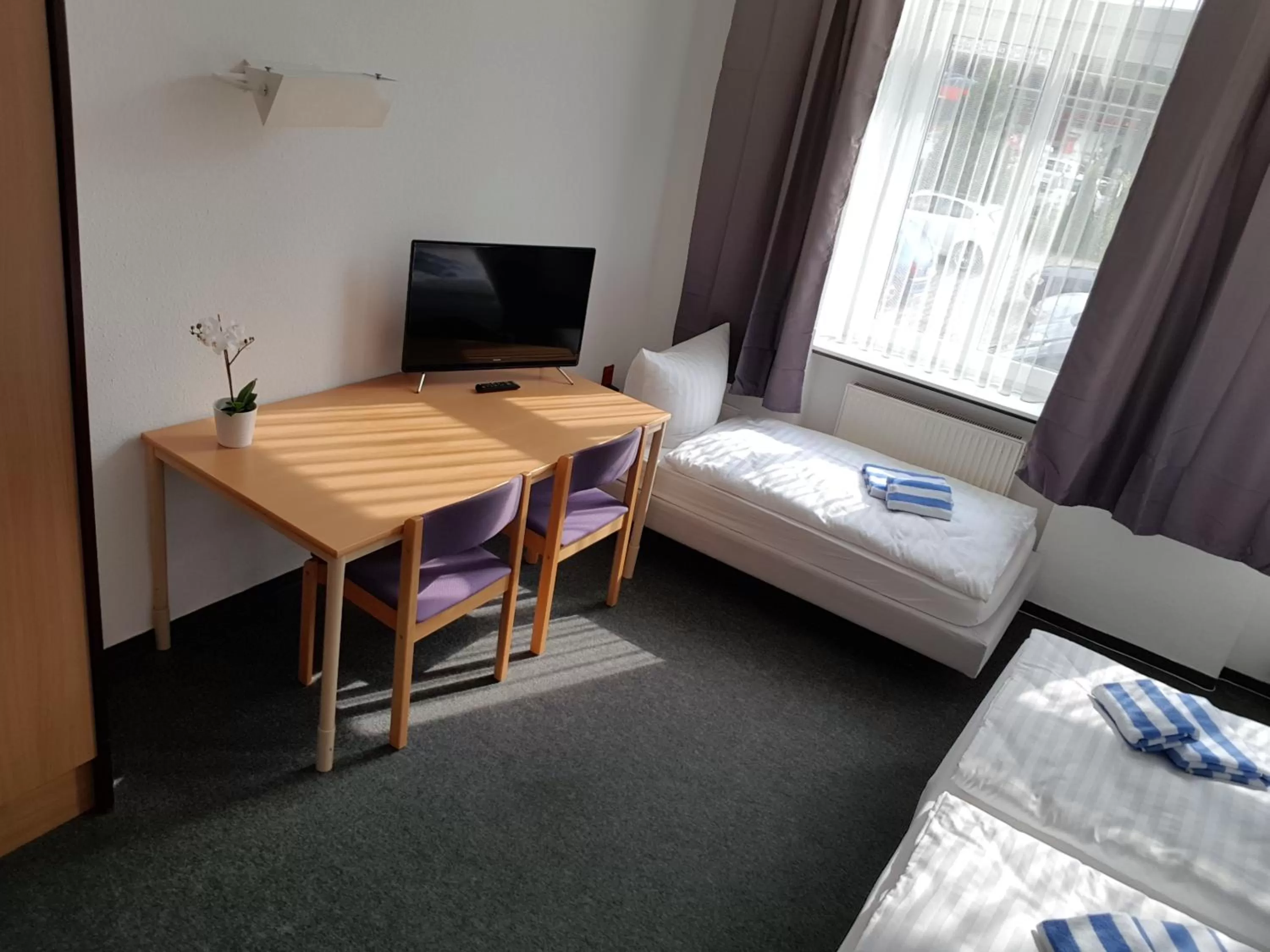 Bed in Appartement-Hotel Rostock
