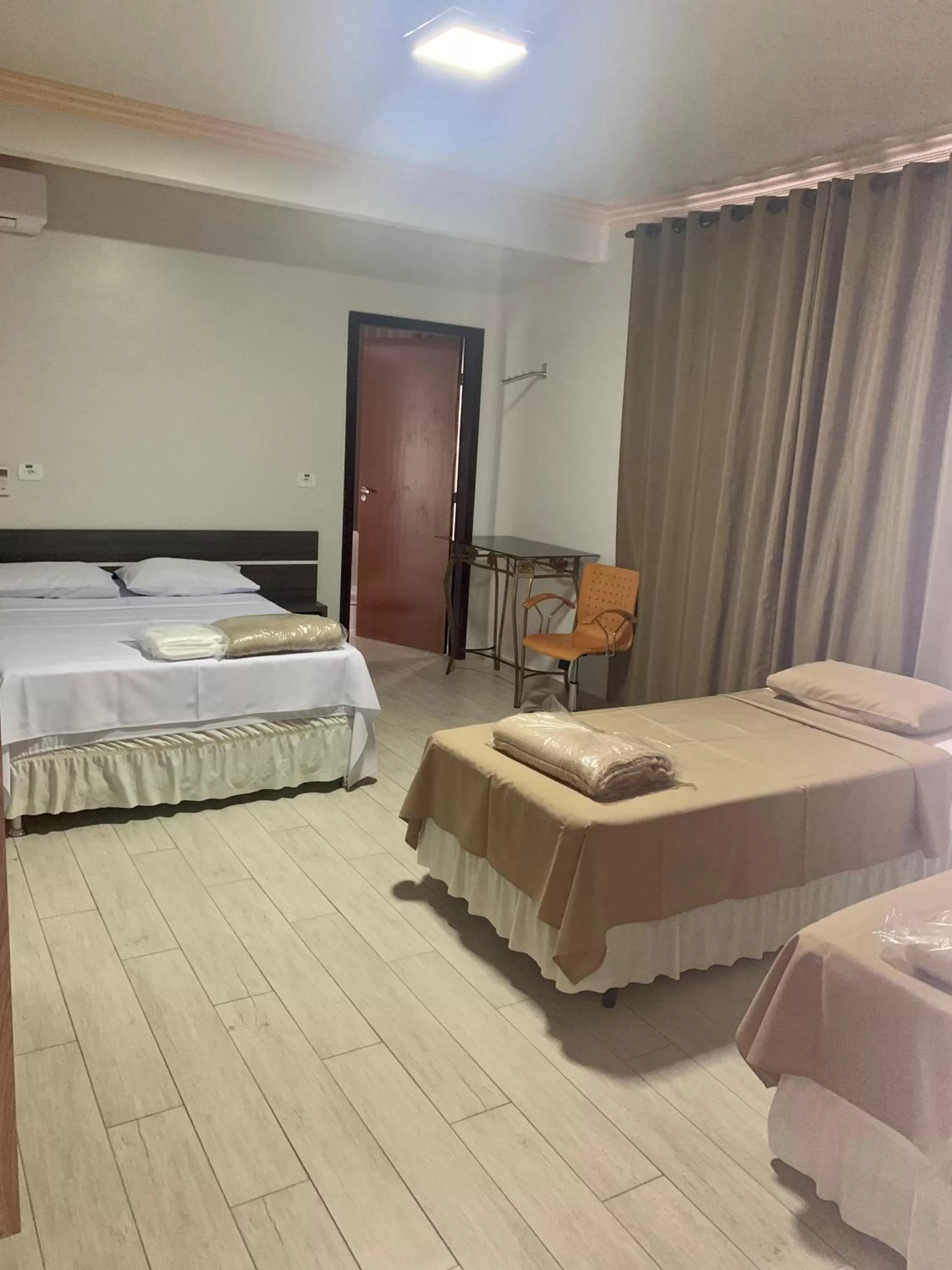 Bed in Hotel Paradizzo