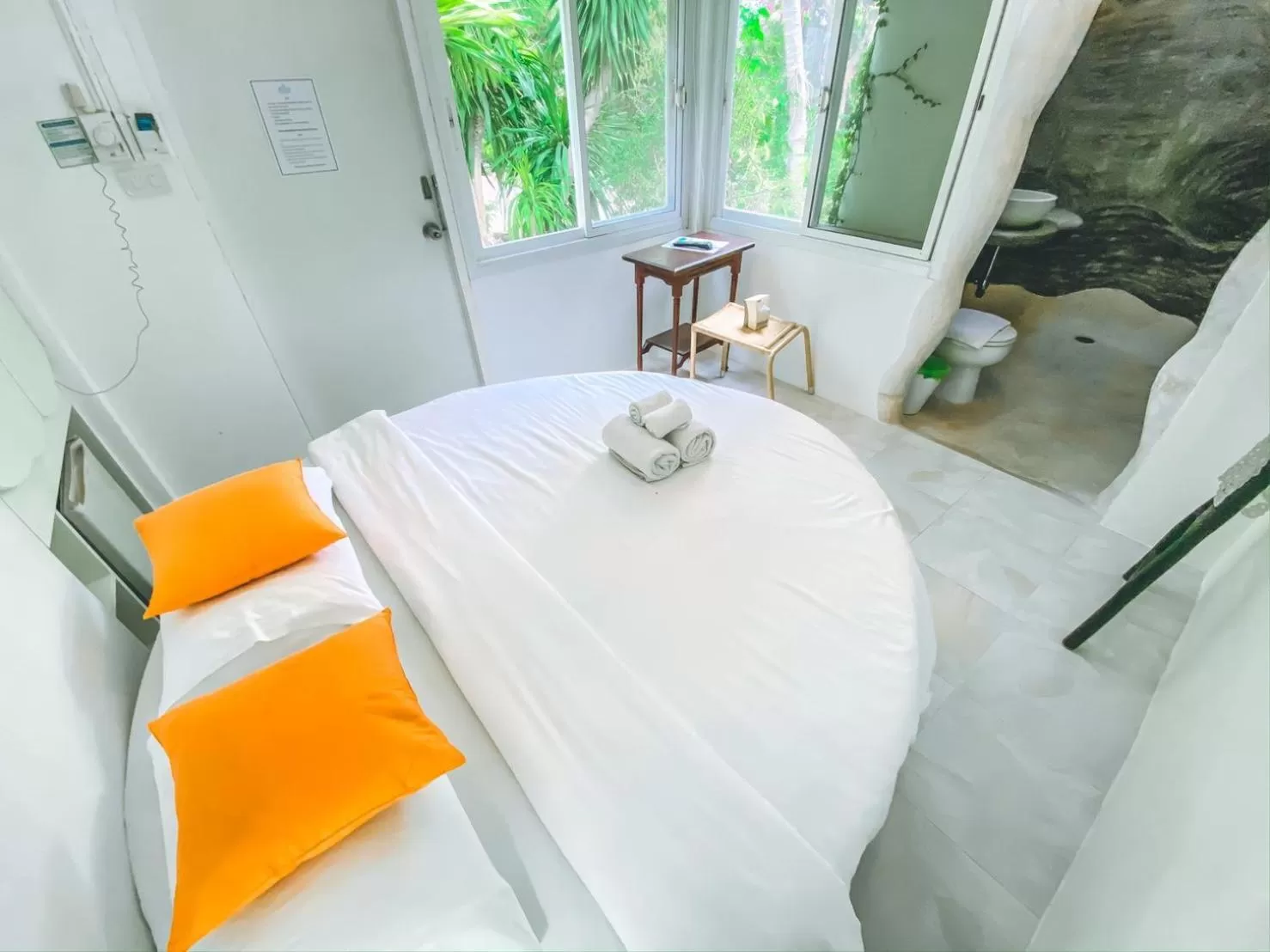 Bed in Nern Chalet Beachfront Hotel