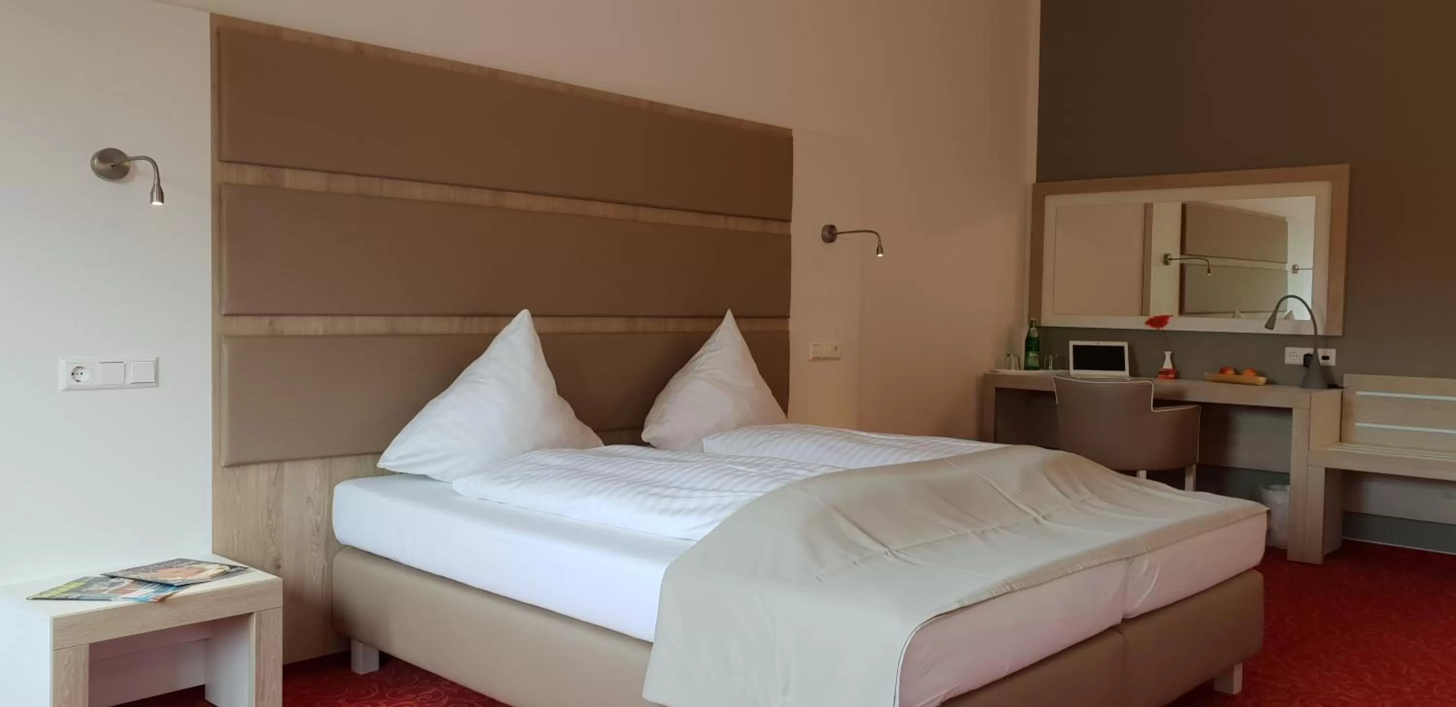 Bed in Confour Hotel