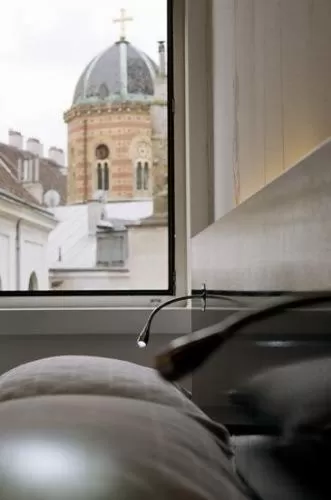 Decorative detail, Bed in Alma Boutique-Hotel