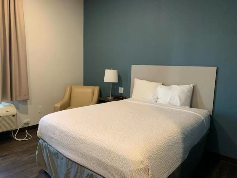 Bed in Candlewood Suites Pecos by IHG