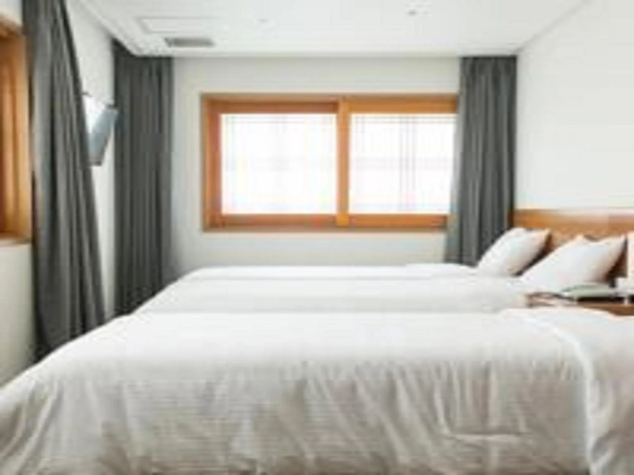 Bedroom, Bed in Busan Tourist Hotel