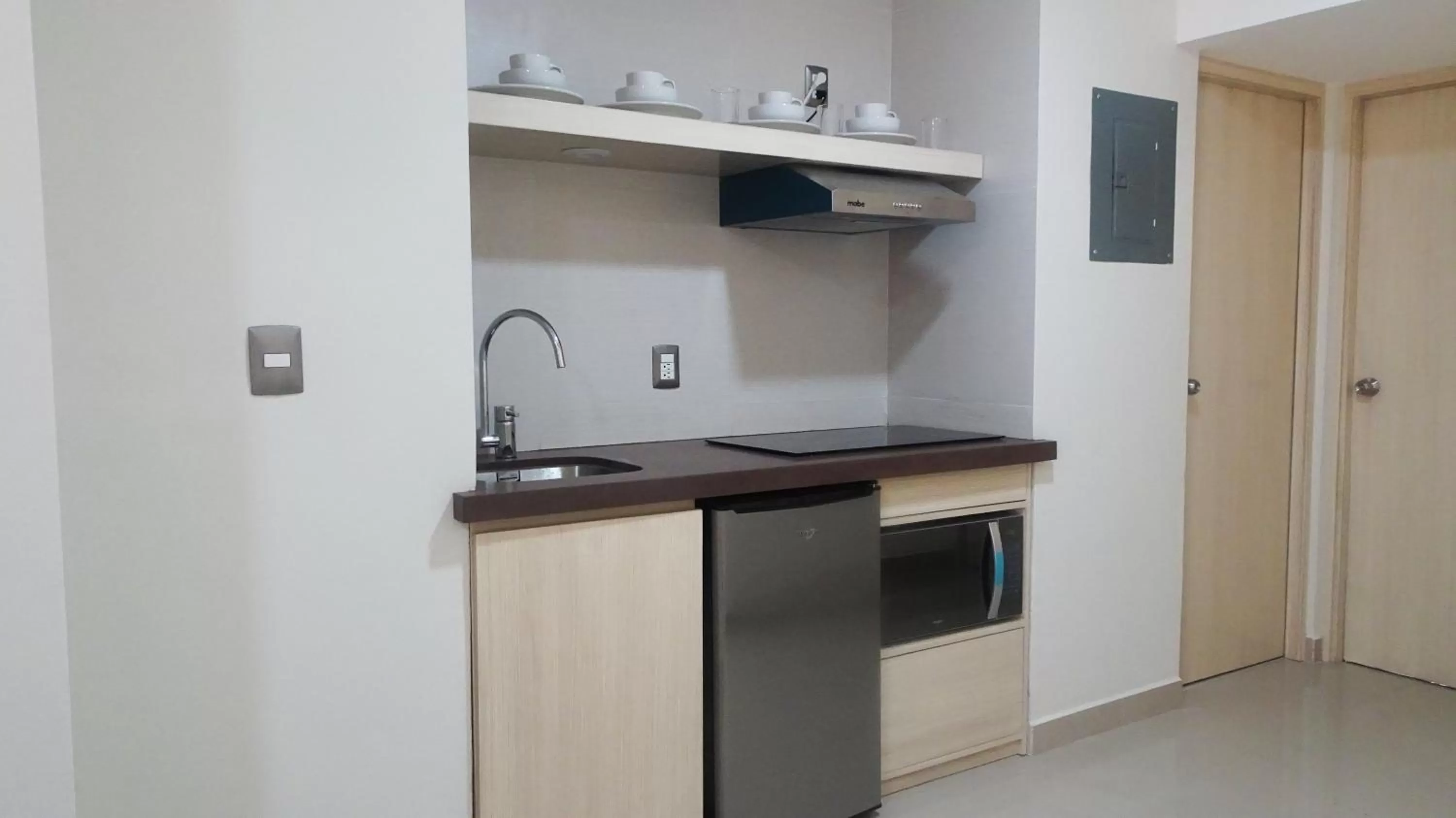 Kitchen or kitchenette in Suites San Luis