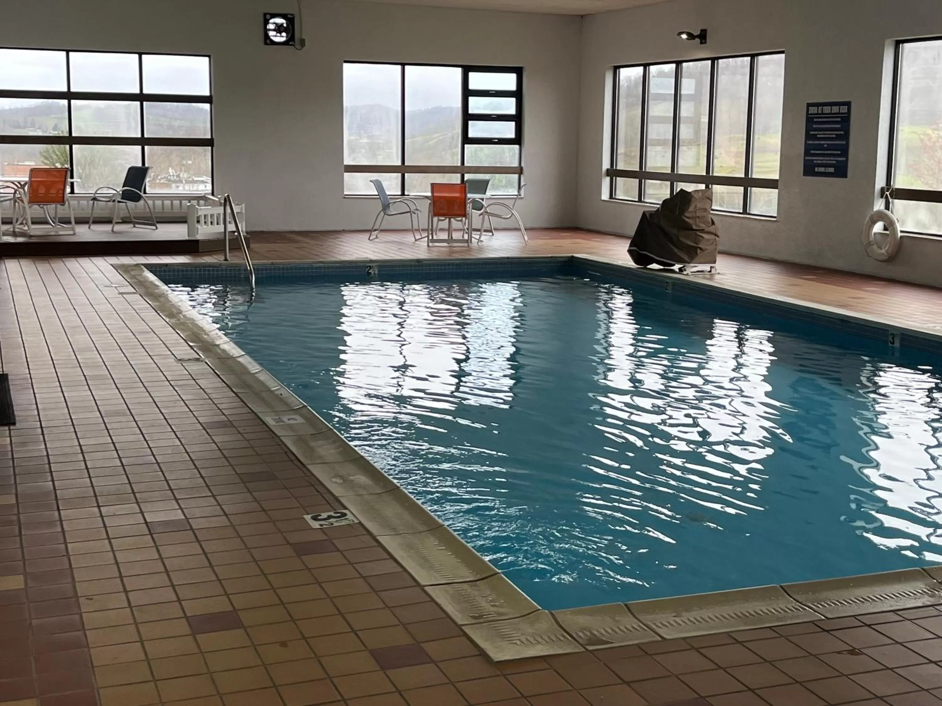 Pool view in Days Inn & Suites by Wyndham Sutton Flatwoods