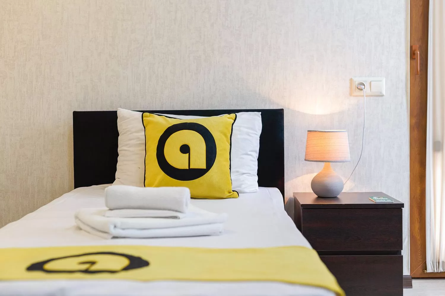 Bed in Aura Plaza Hotel