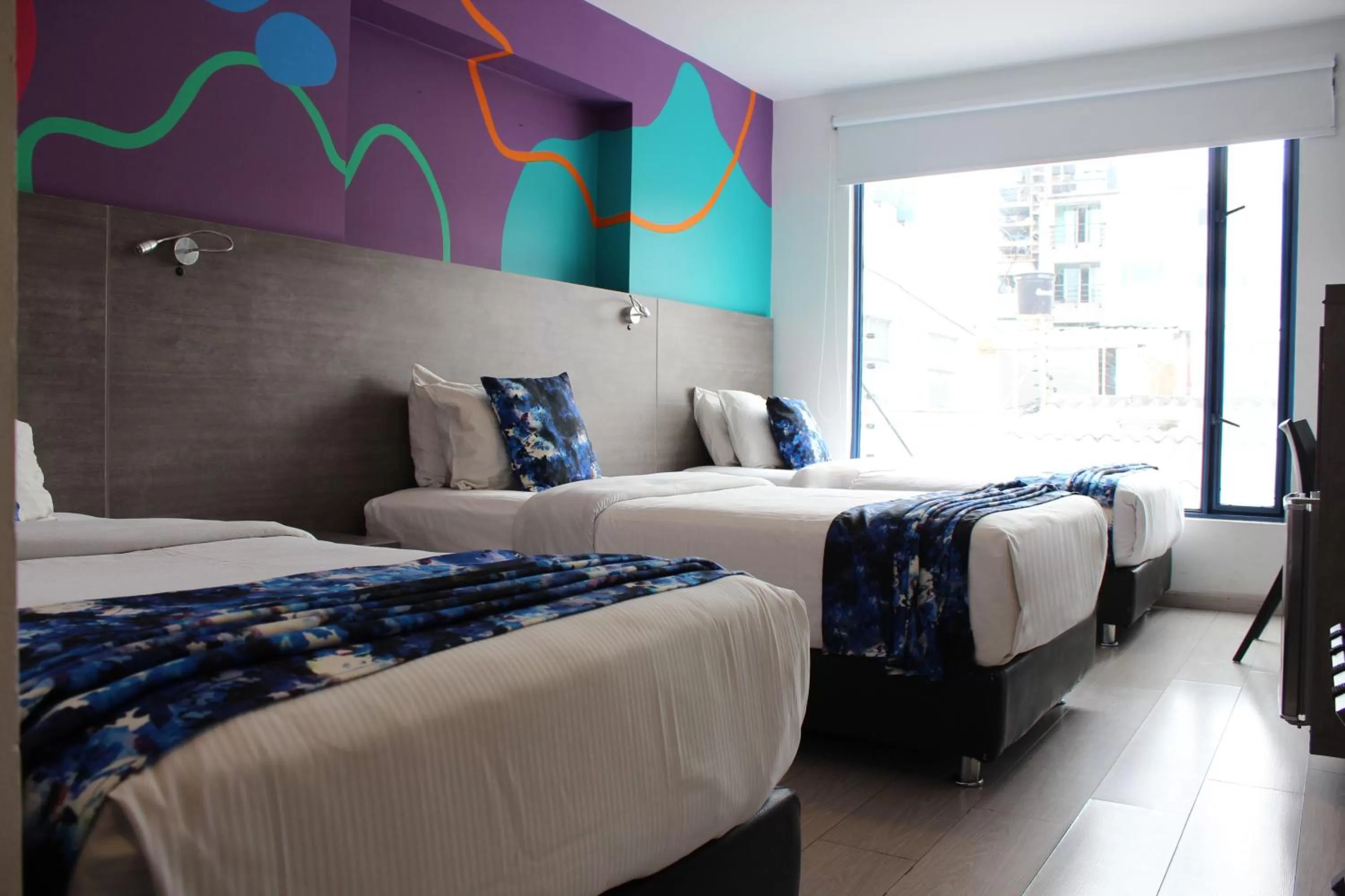 Bed in Agora Suites Self-Service Boutique Hotel