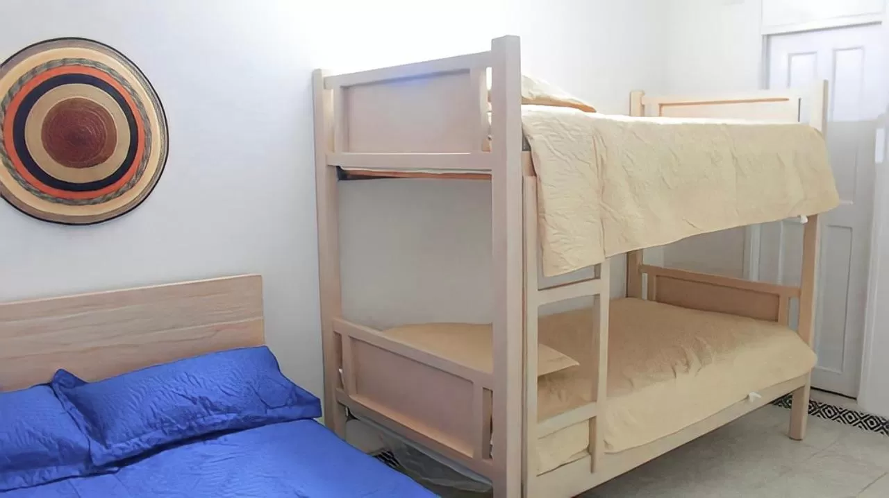 Bed, Bunk Bed in Hotel Iraka Zenu