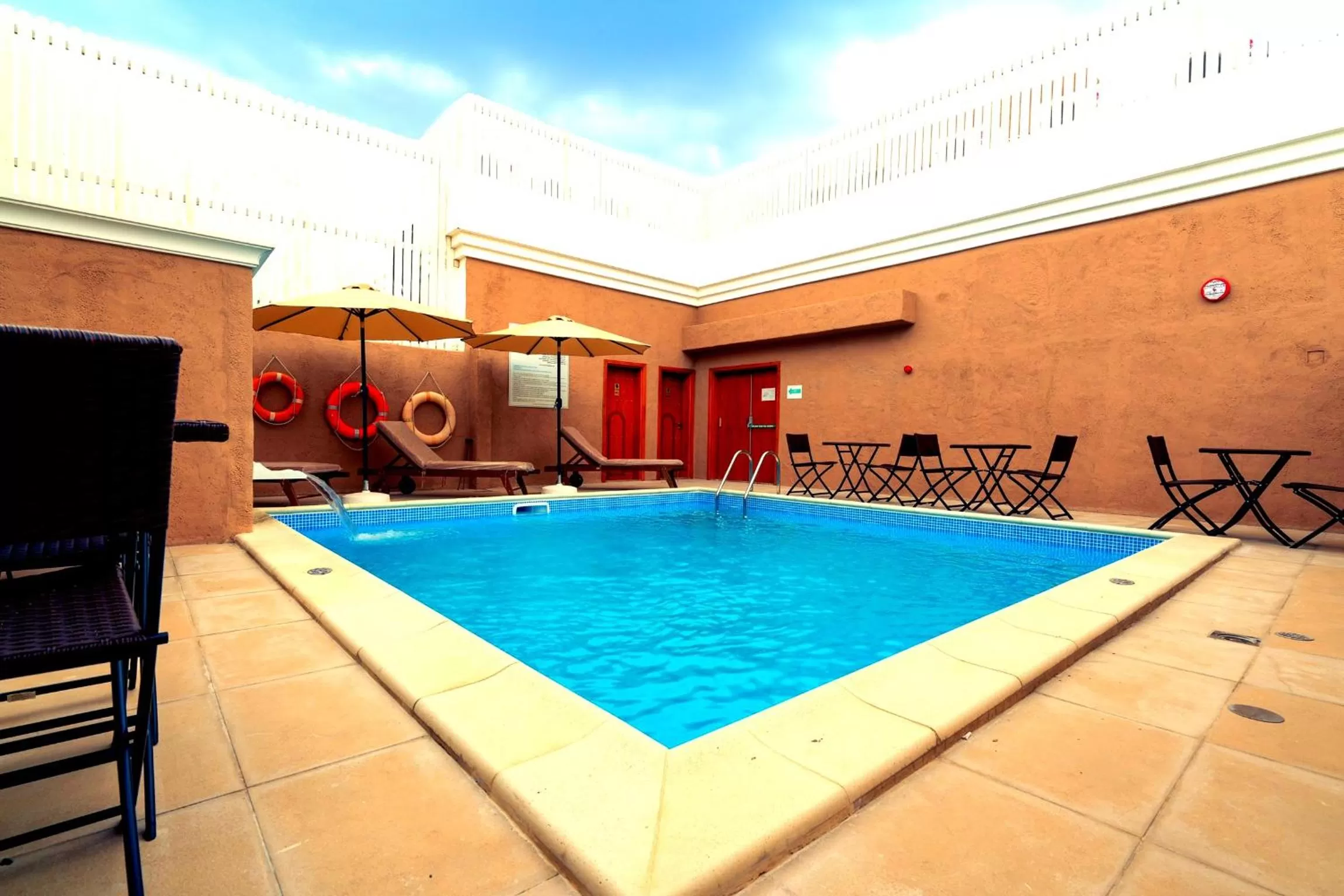 Swimming pool in Al Liwan Suites Rawdat Al Khail