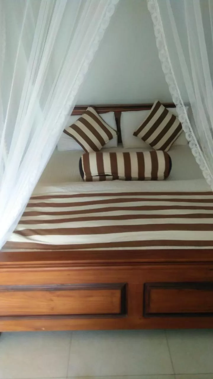 Bed in Maple Home Stay