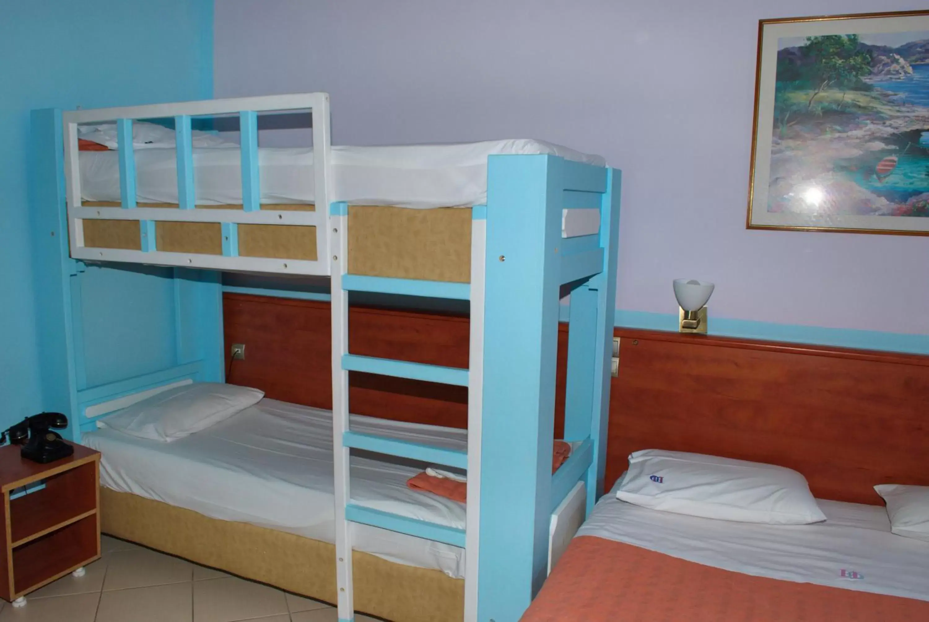 Classic Quadruple Room in Diethnes Hotel Classic Quadruple Room in Diethnes Hotel