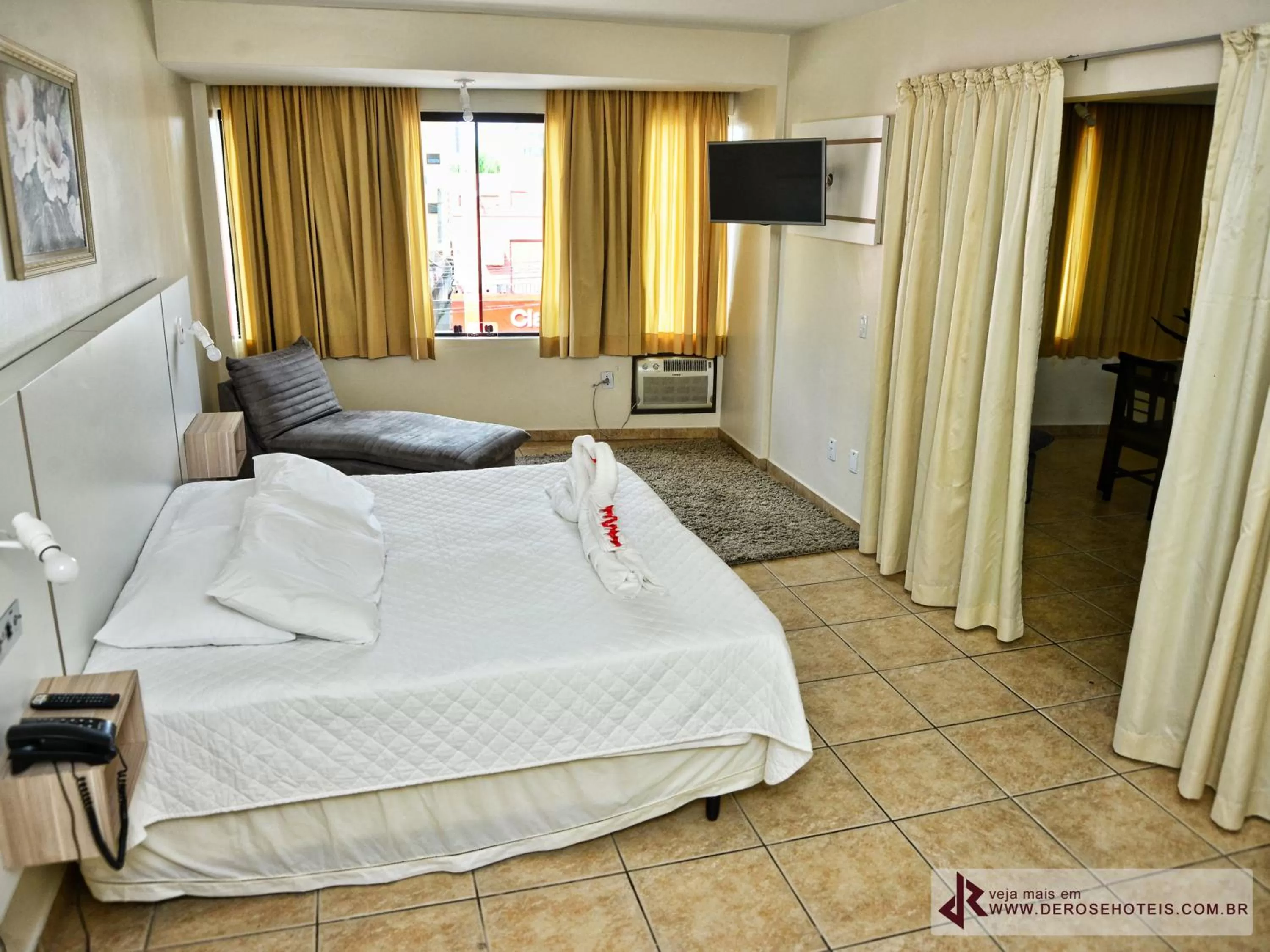 Bed in De Rose Palace Hotel