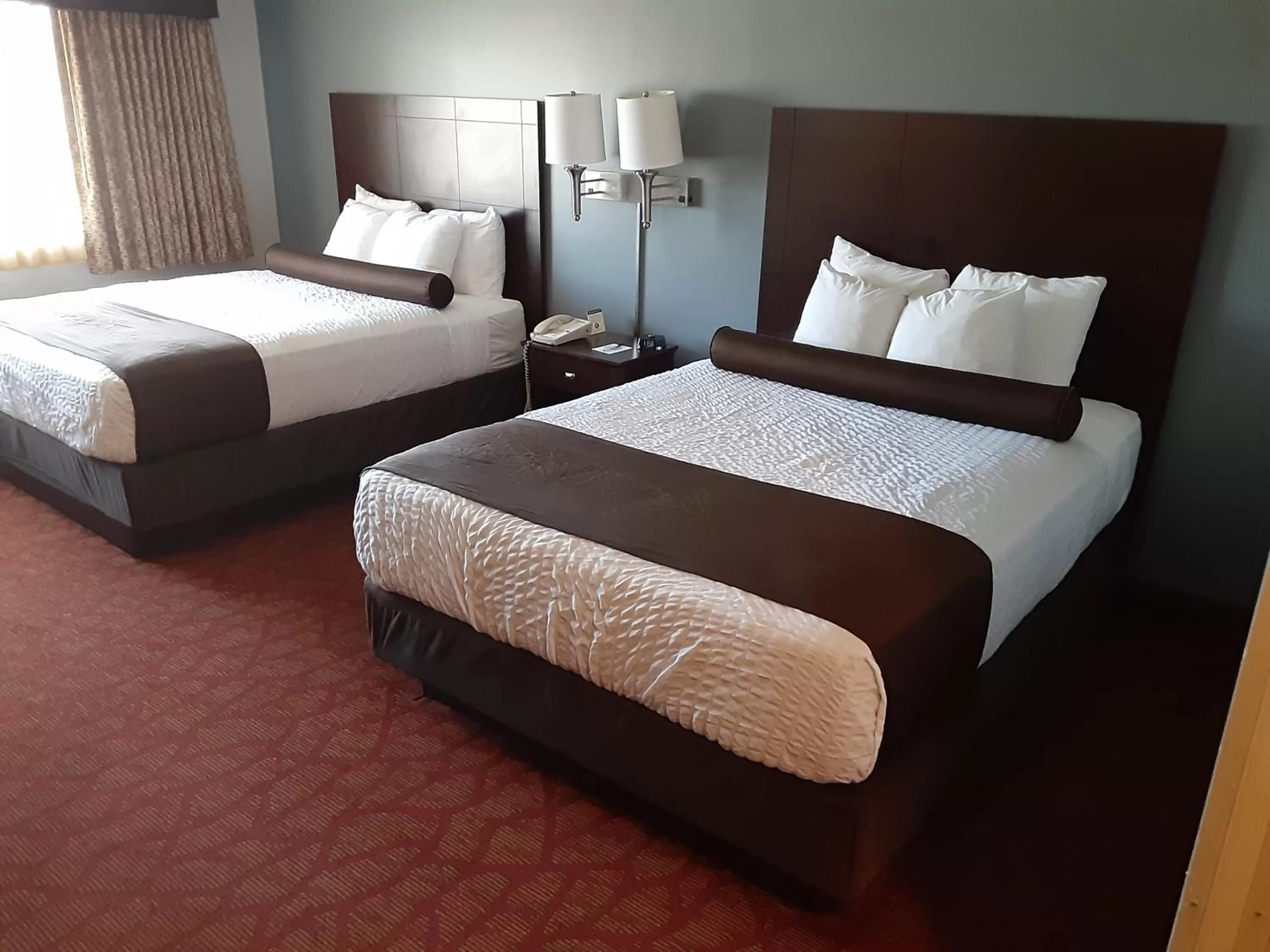 Bed in Boarders Inn & Suites by Cobblestone Hotels - Superior/Duluth
